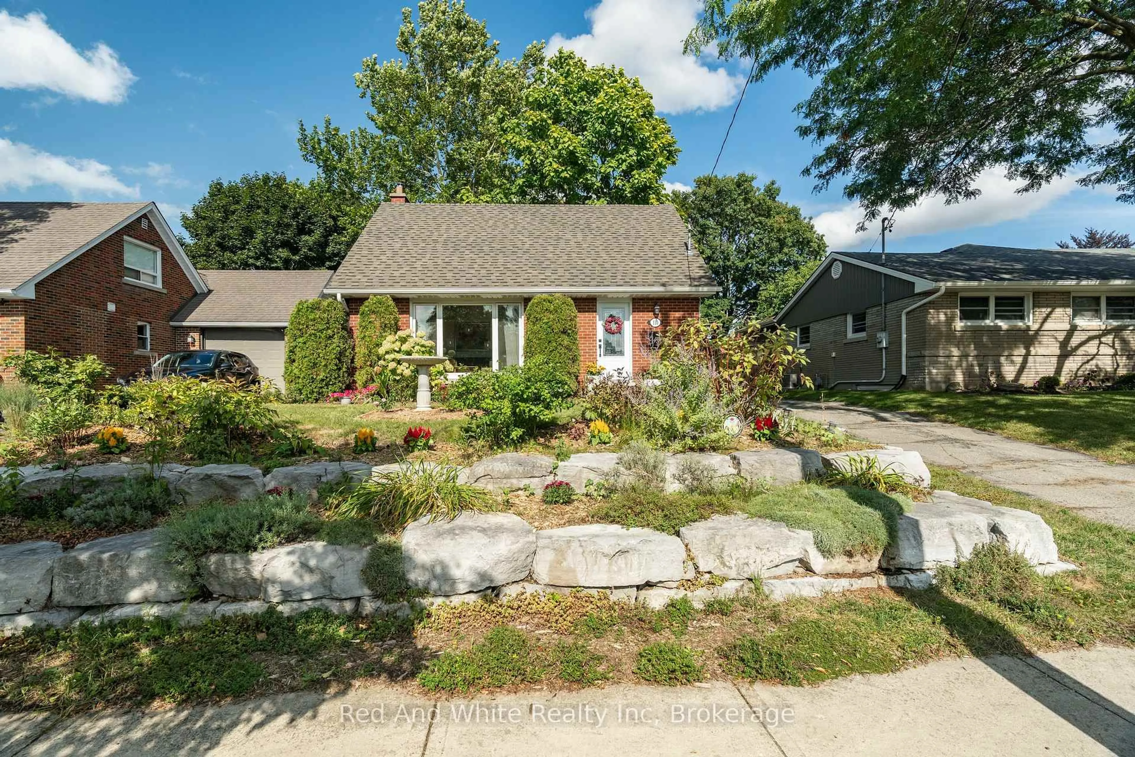 Home with brick exterior material, street for 110 Ellis Cres, Waterloo Ontario N2J 2B8
