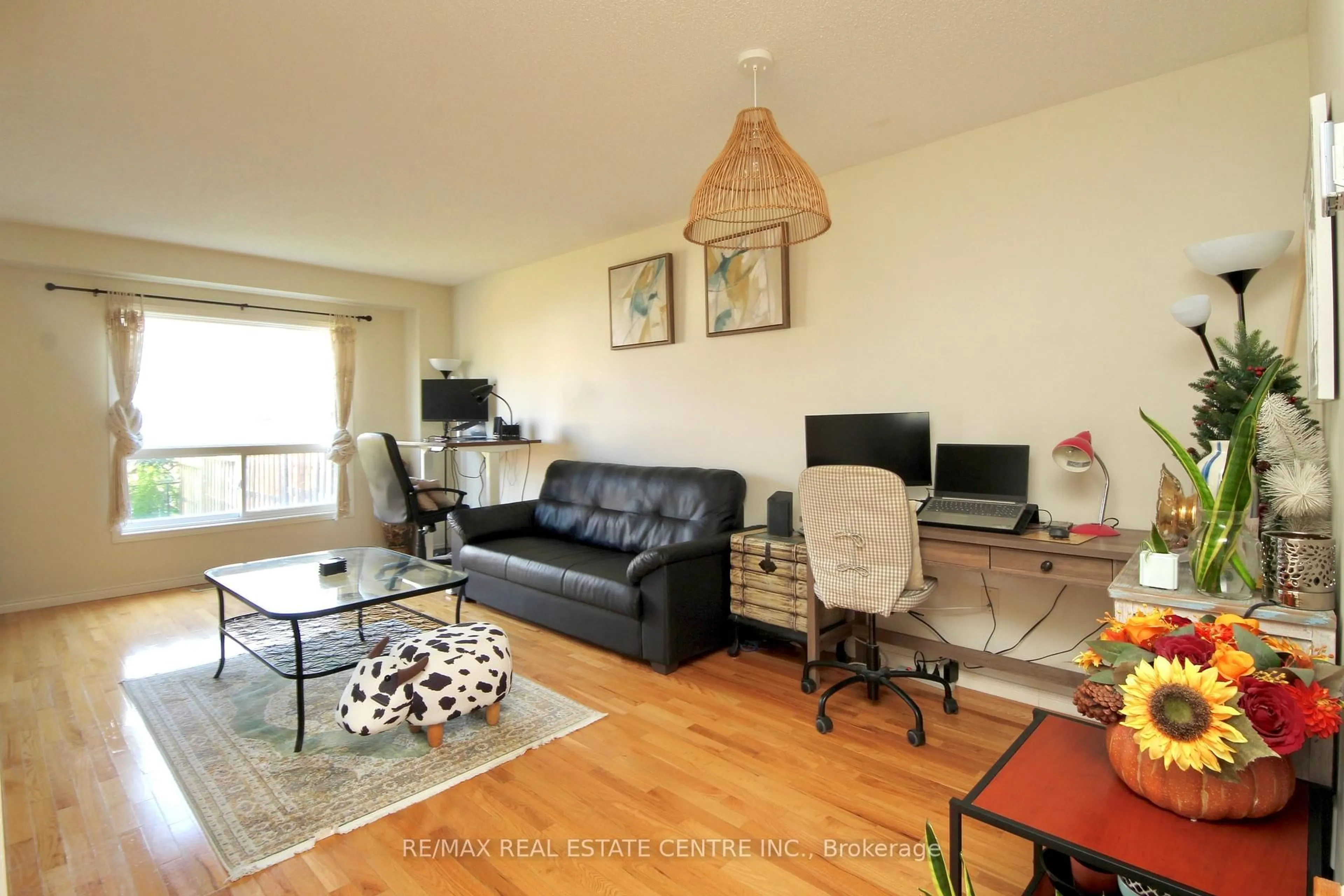 Living room with furniture, wood/laminate floor for 40 EUGENE Dr, Guelph Ontario N1L 1P6