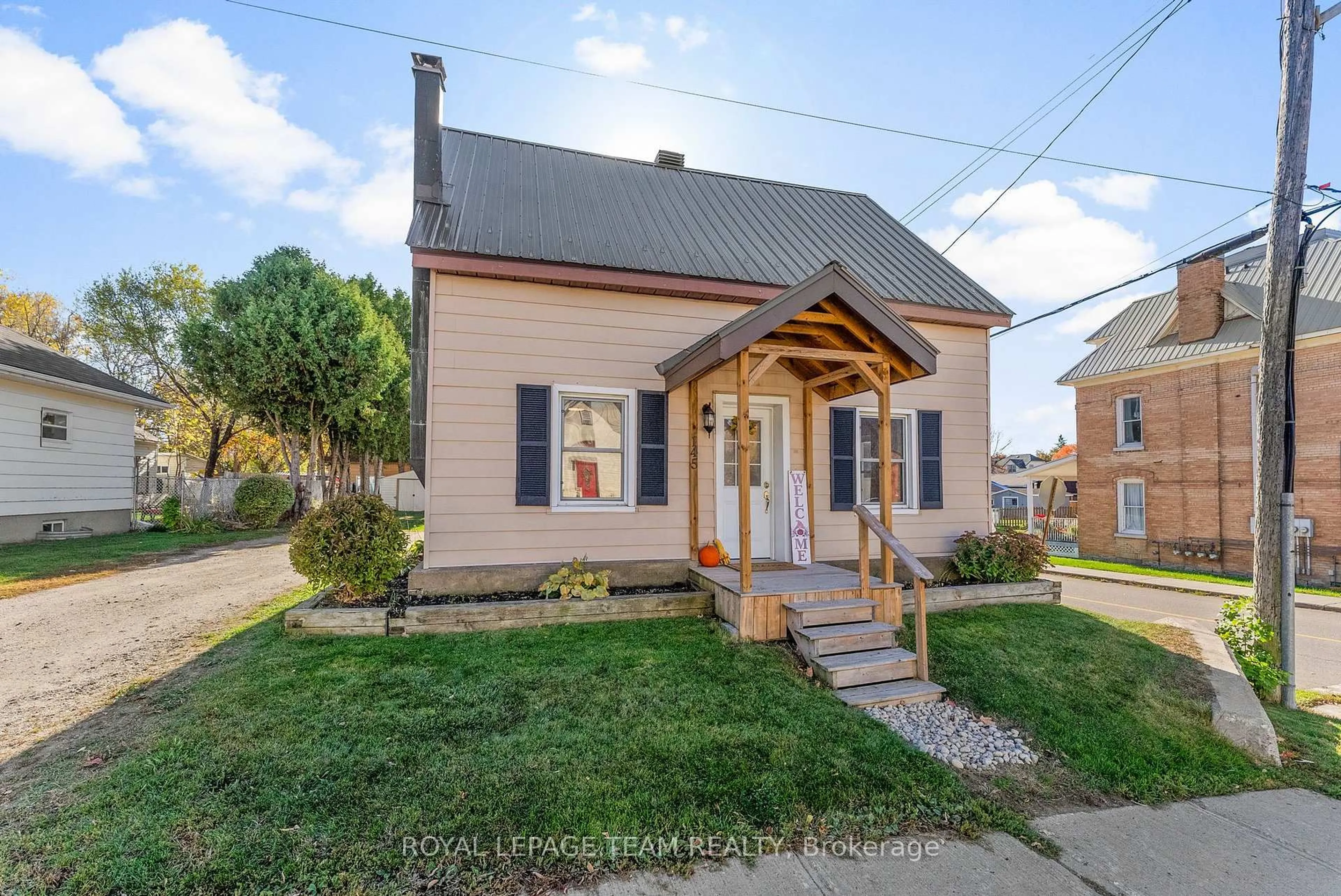 Home with brick exterior material, street for 145 Munroe Ave, Renfrew Ontario K7V 3L2