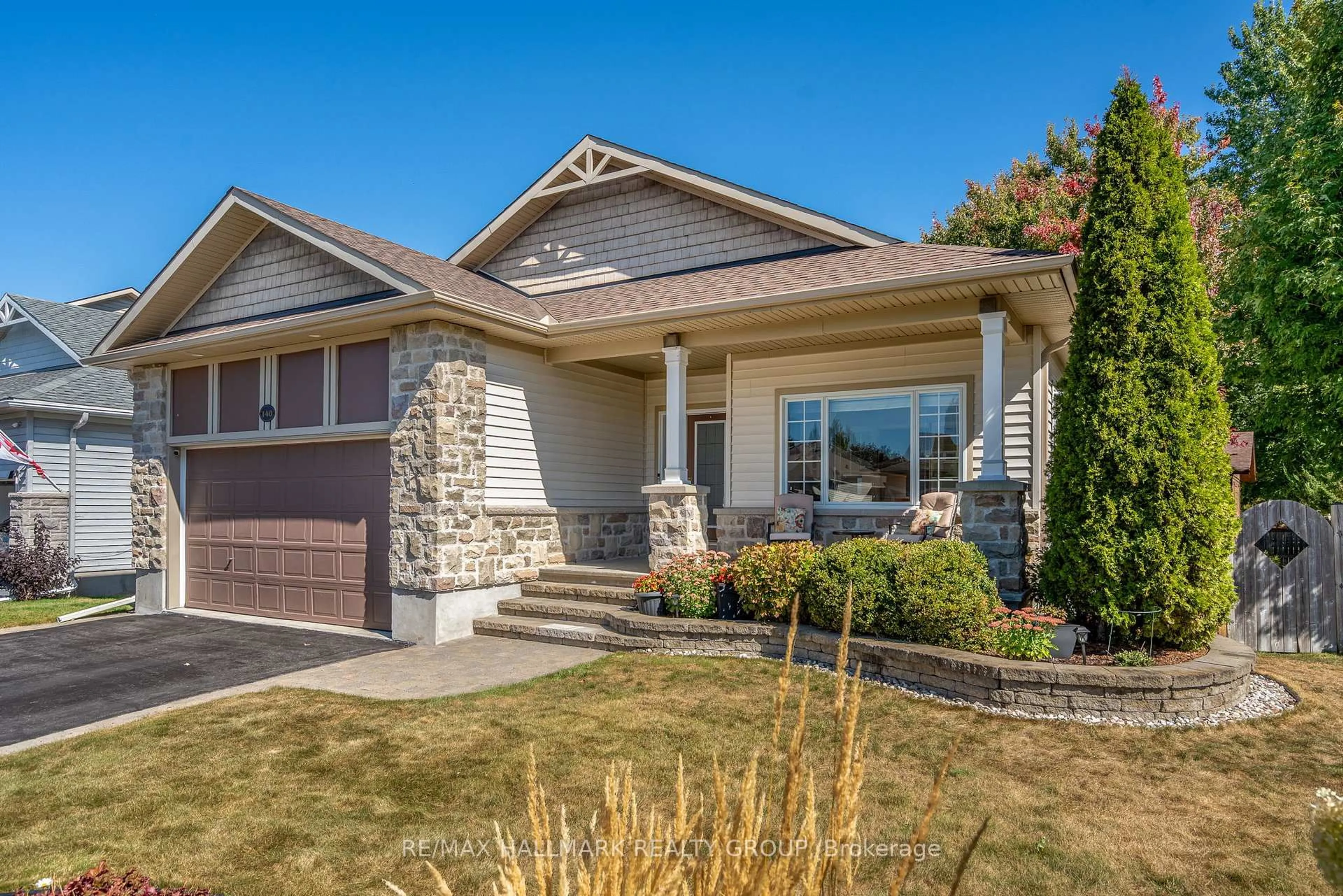 Home with vinyl exterior material, street for 140 Peckett Dr, Carleton Place Ontario K7C 4V3