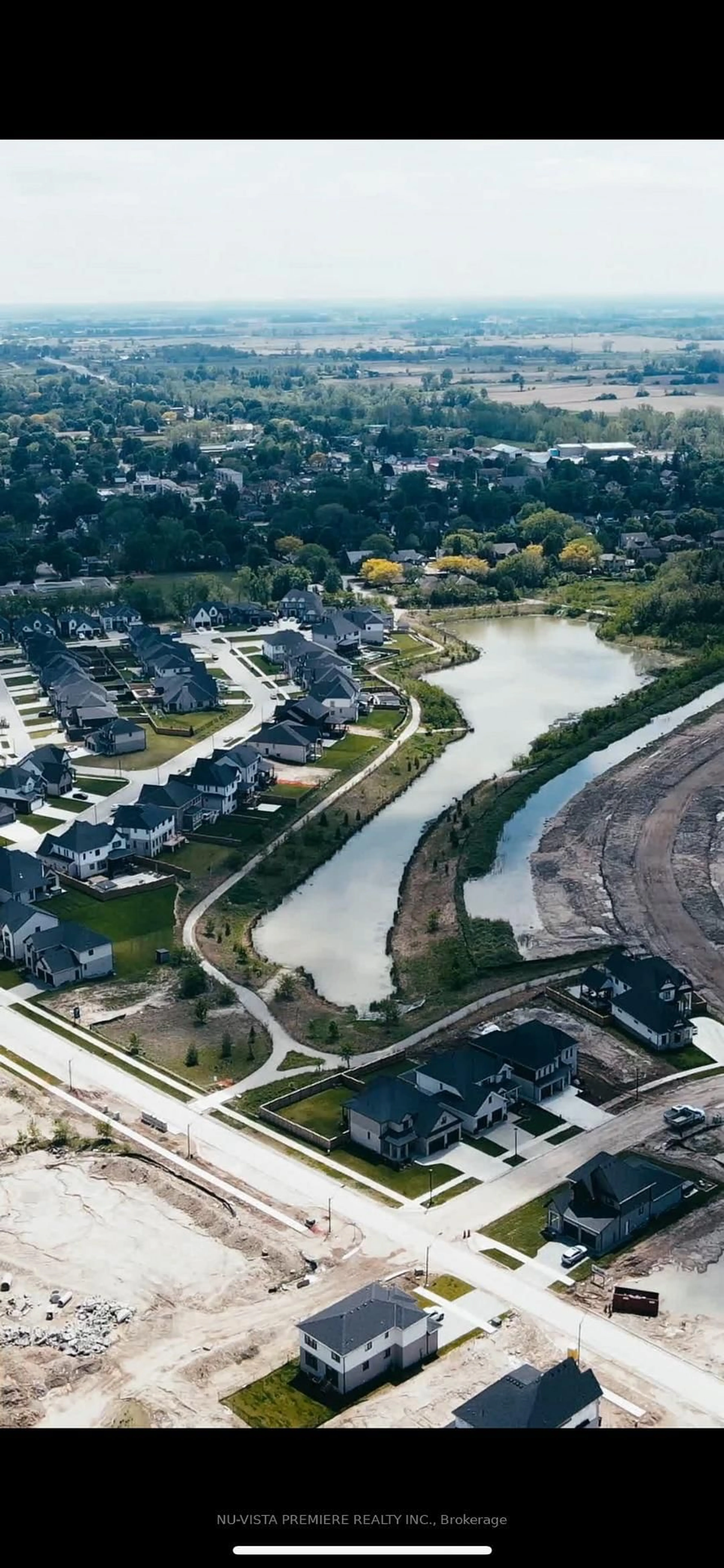 A pic from outside/outdoor area/front of a property/back of a property/a pic from drone, water/lake/river/ocean view for 4146 Fallingbrook Rd, London South Ontario N6P 1H5