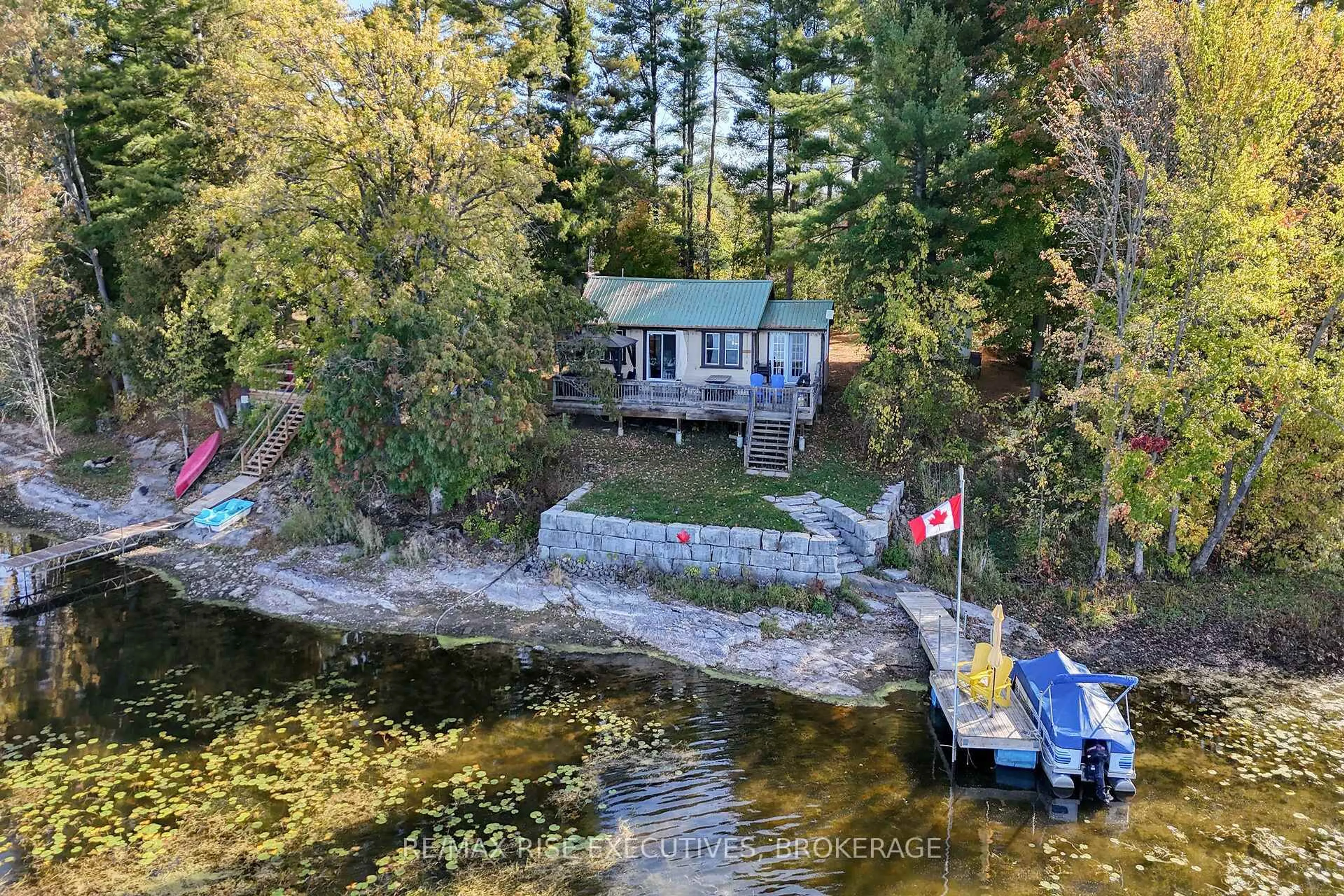 A pic from outside/outdoor area/front of a property/back of a property/a pic from drone, water/lake/river/ocean view for 465K Lyndhurst Rd, Leeds and the Thousand Islands Ontario K0E 1N0