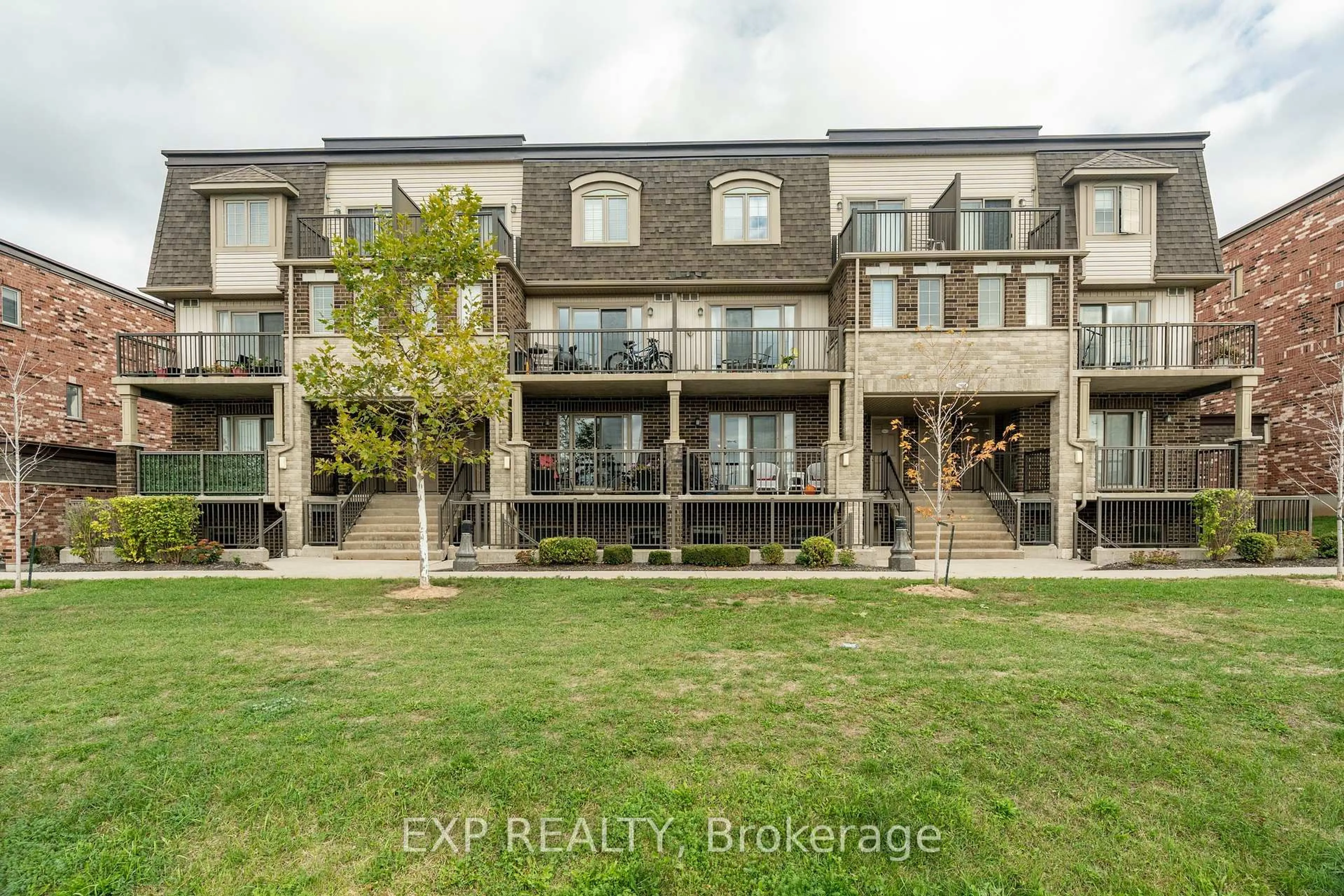 A pic from outside/outdoor area/front of a property/back of a property/a pic from drone, unknown for 1662 Fischer Hallman Rd #18, Kitchener Ontario N2R 0C6