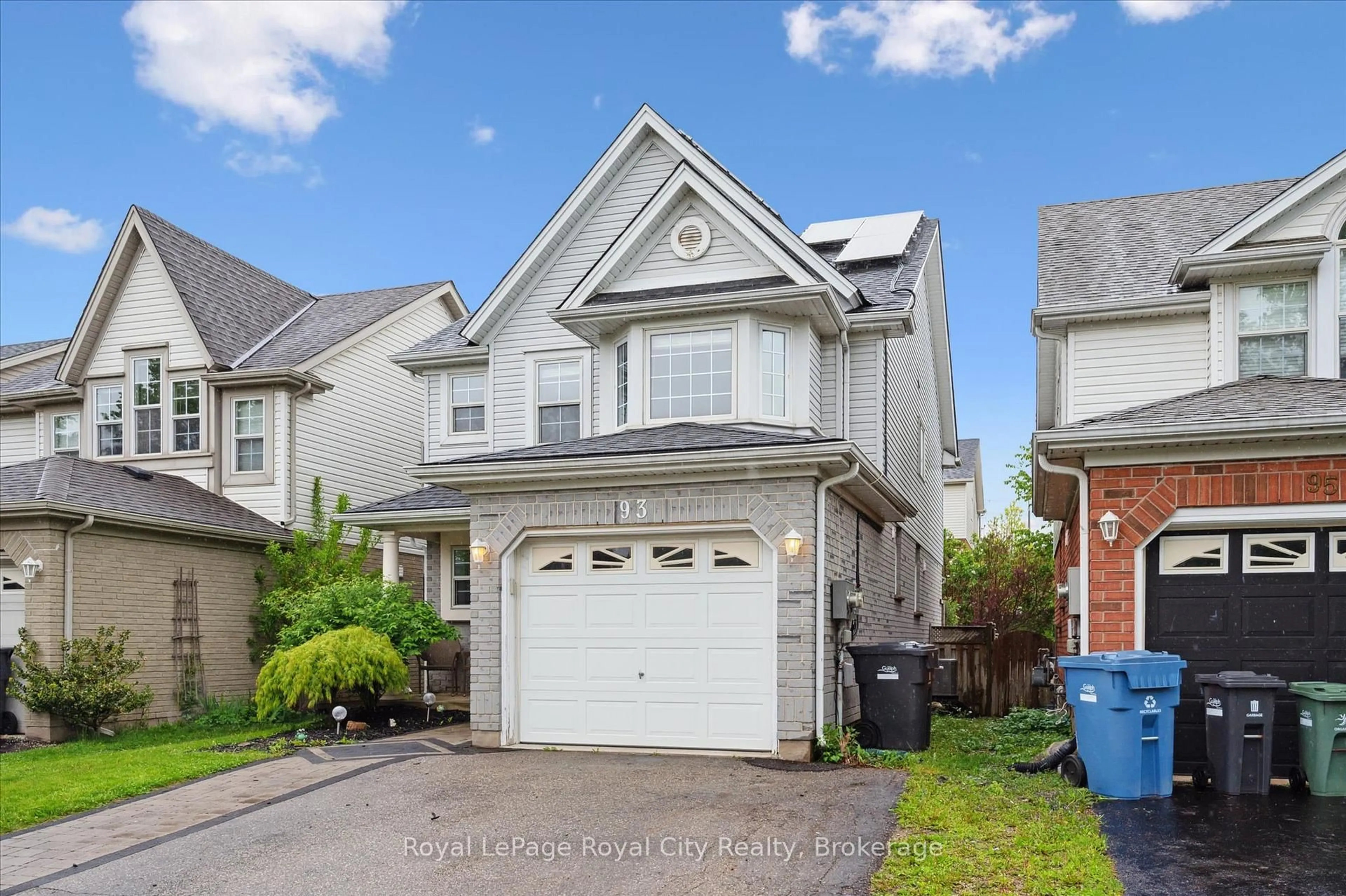 Home with vinyl exterior material, street for 93 Doyle Dr, Guelph Ontario N1G 5B9