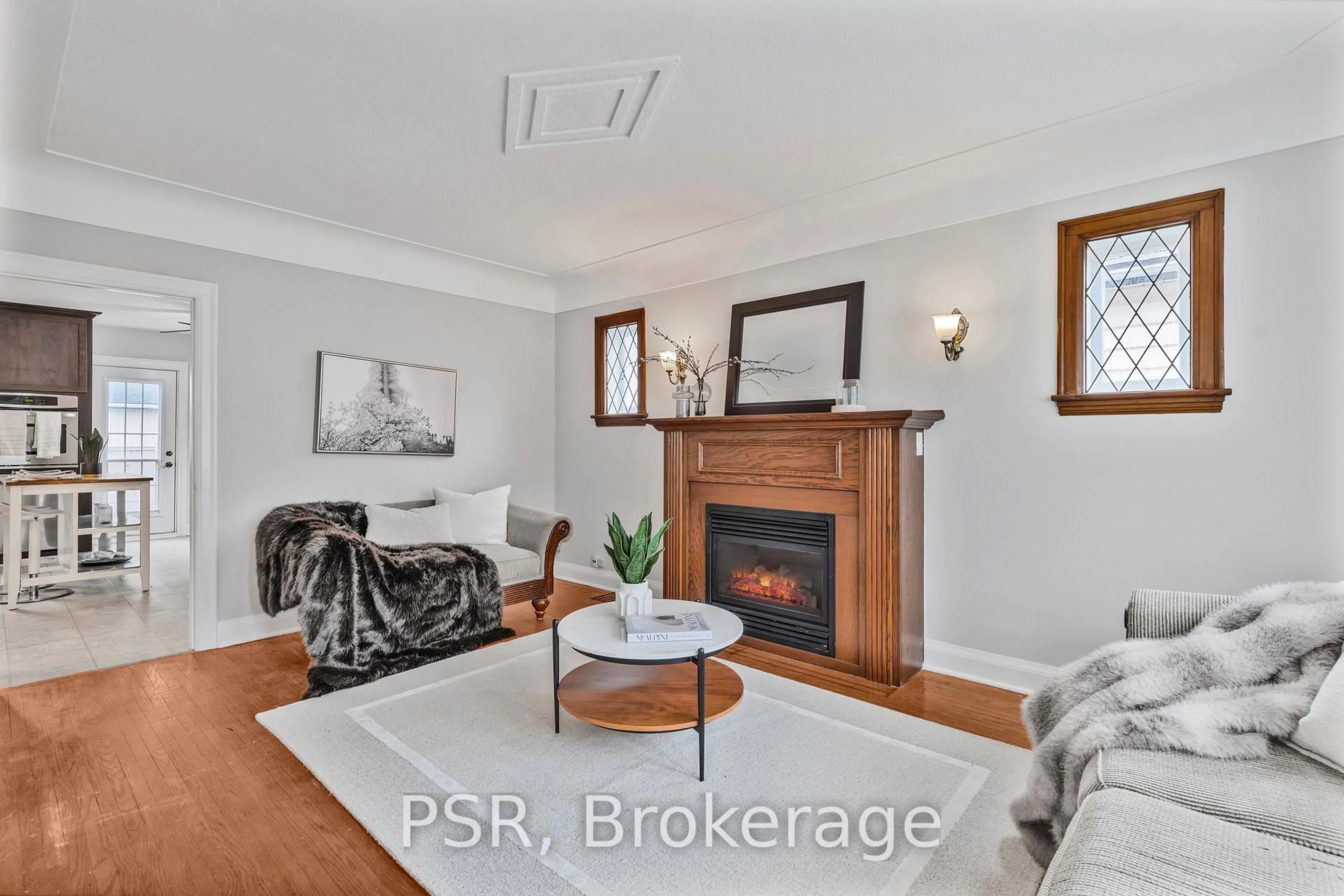 Living room with furniture, wood/laminate floor for 187 West 2nd St, Hamilton Ontario L9C 3G2
