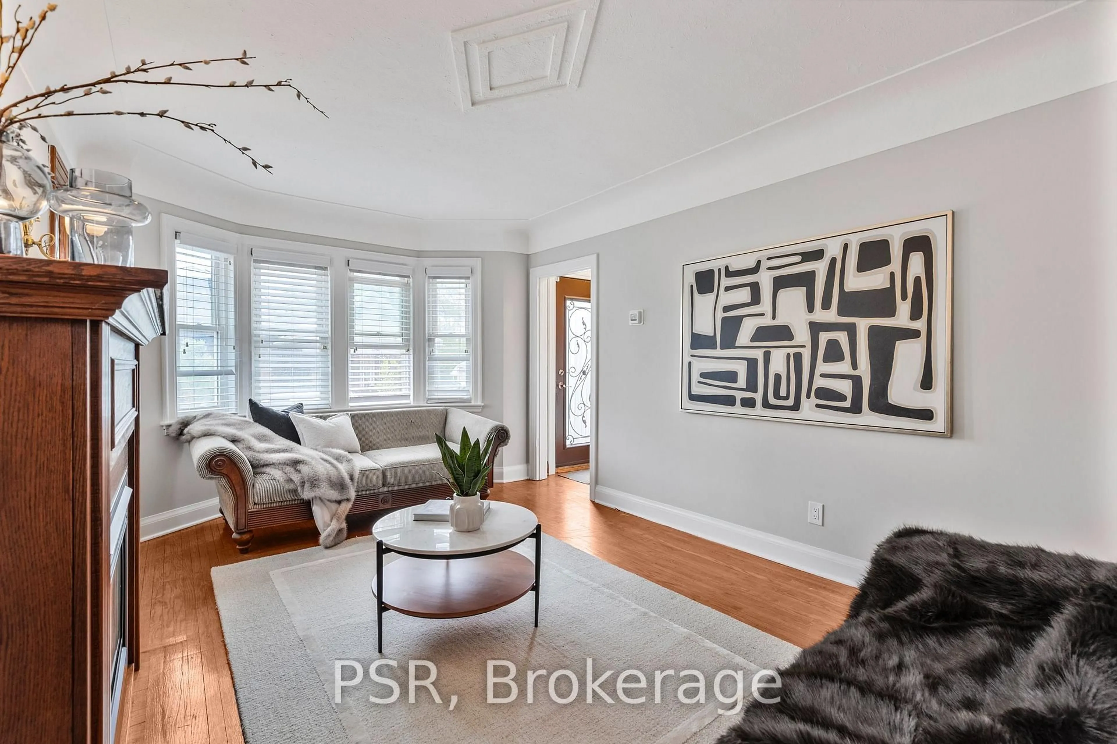 Living room with furniture, wood/laminate floor for 187 West 2nd St, Hamilton Ontario L9C 3G2