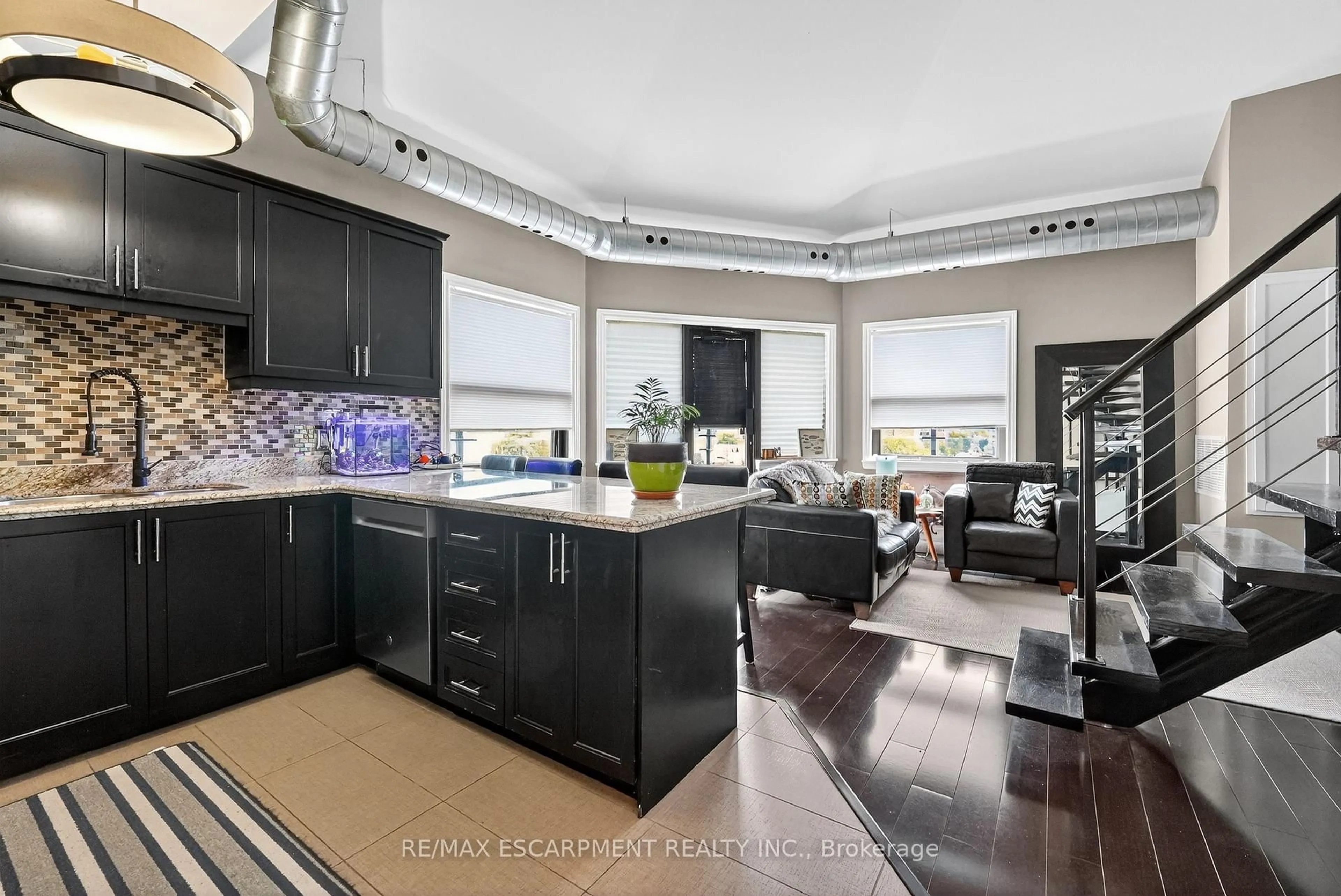 Open concept kitchen, ceramic/tile floor for 80 King William St #404, Hamilton Ontario L8R 0A1