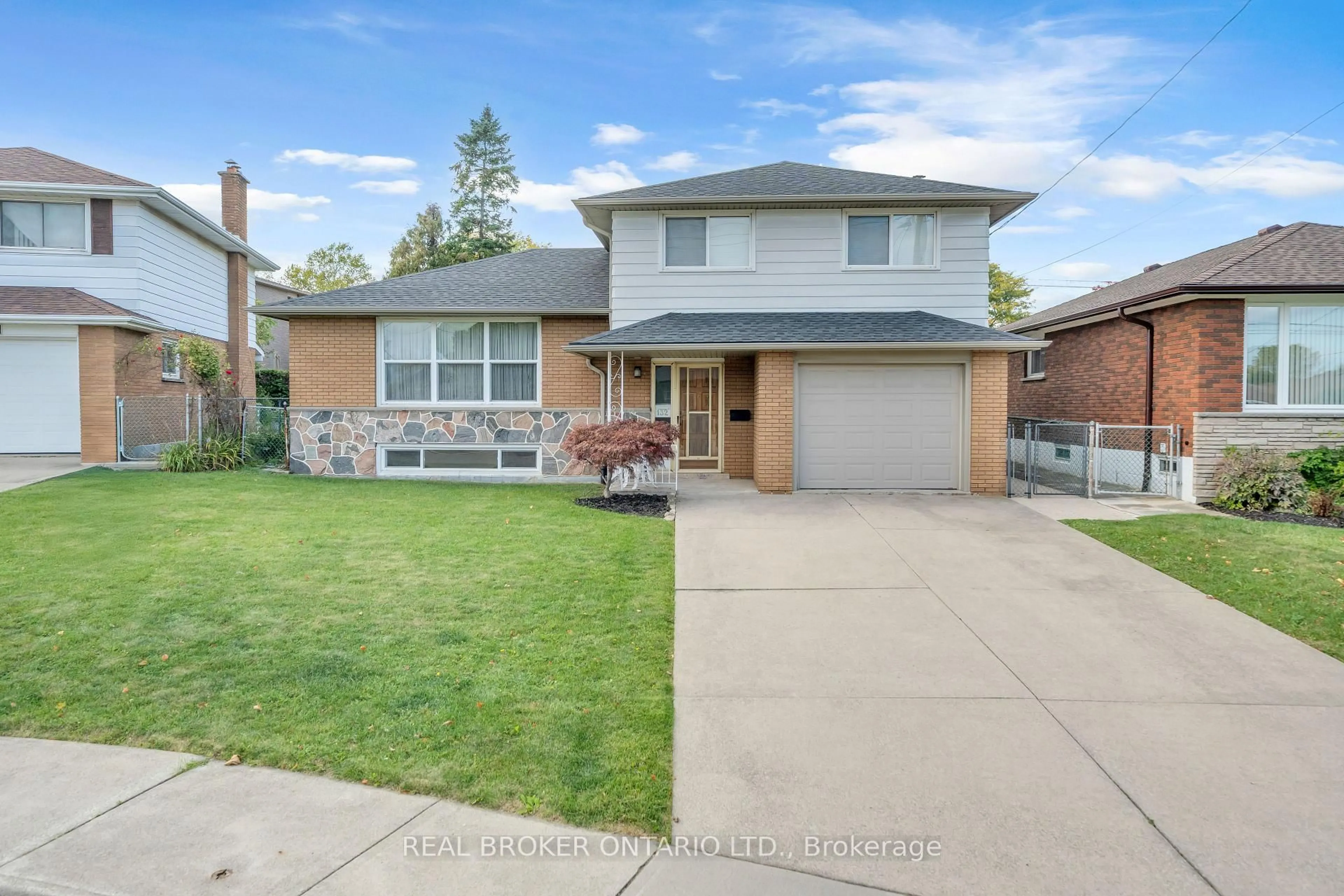 Home with brick exterior material, street for 132 Greeningdon Dr, Hamilton Ontario L9A 4W7