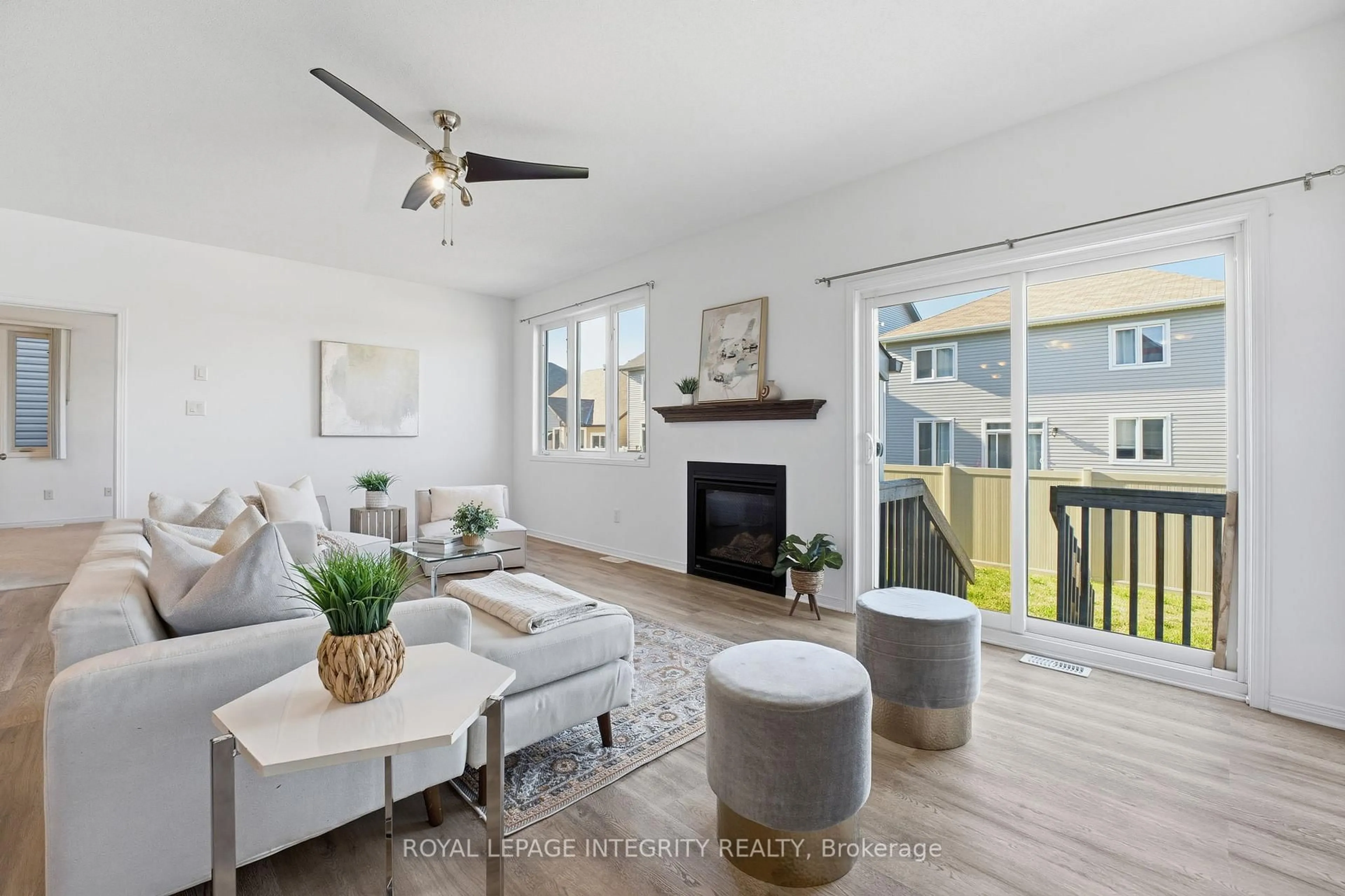 Living room with furniture, wood/laminate floor for 200 Rover St, Ottawa Ontario K2V 0G2