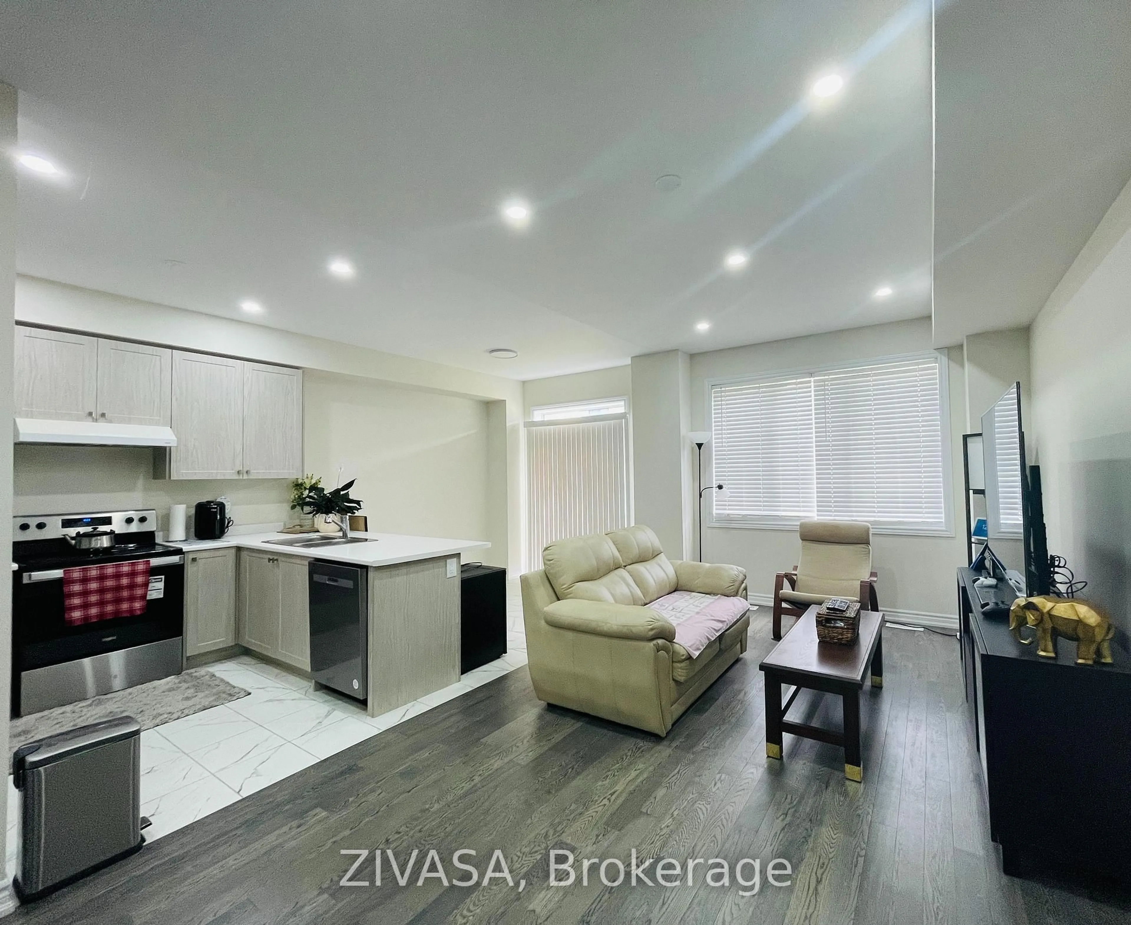 Open concept kitchen, wood/laminate floor for 40 Sun Haven Lane, Thorold Ontario L2V 0K6