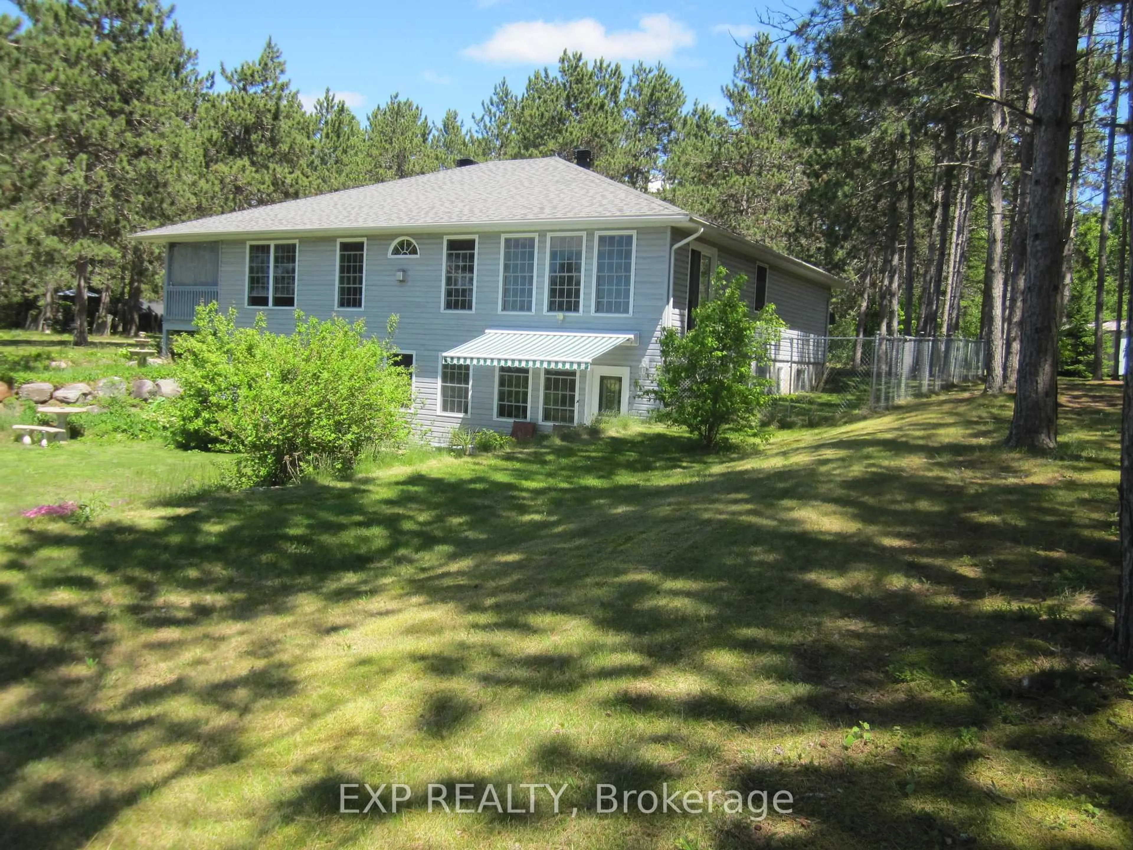 A pic from outside/outdoor area/front of a property/back of a property/a pic from drone, forest/trees view for 10 Cybulski Rd, Barry's Bay Ontario K0J 1B0