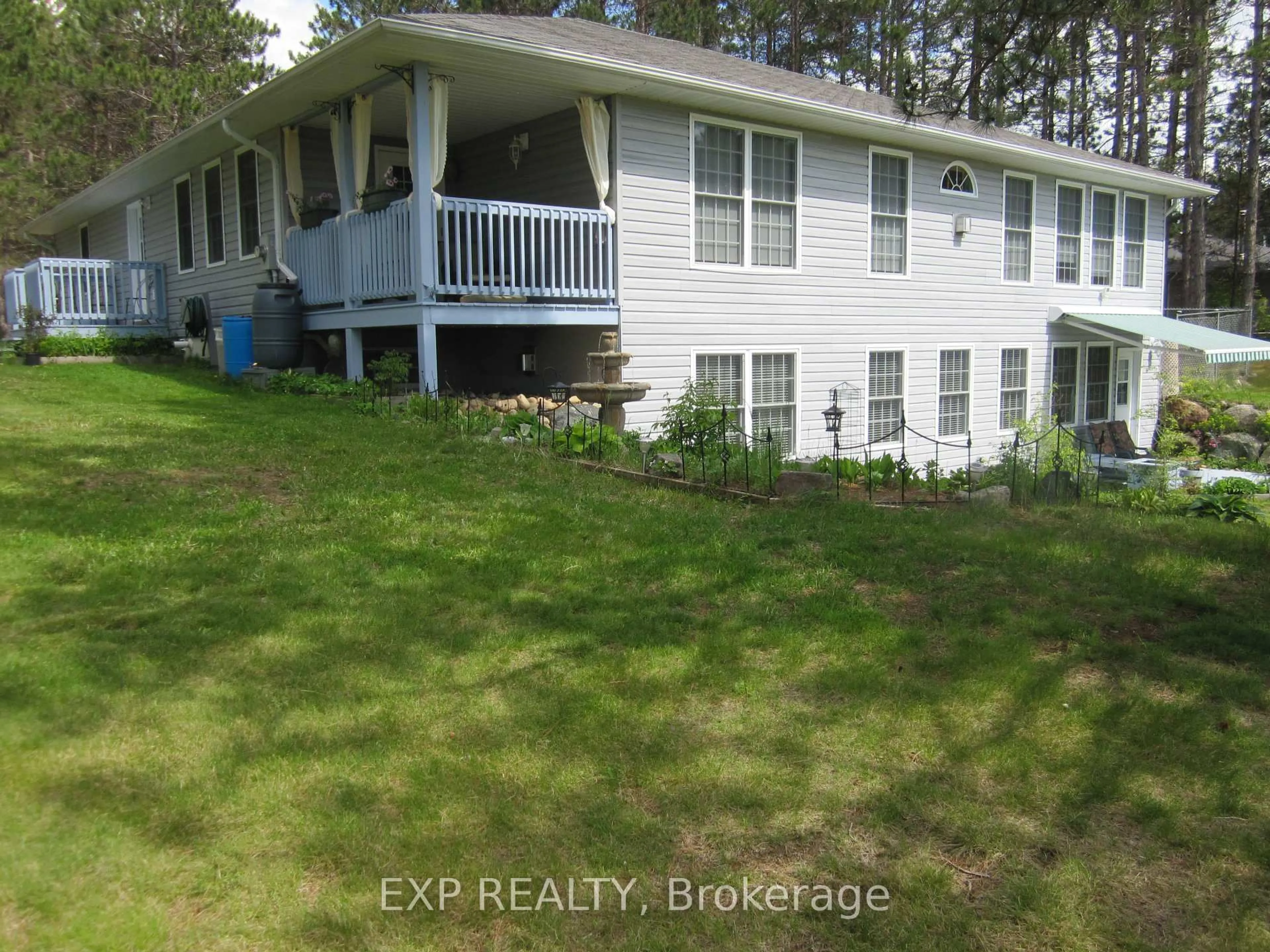 A pic from outside/outdoor area/front of a property/back of a property/a pic from drone, water/lake/river/ocean view for 10 Cybulski Rd, Barry's Bay Ontario K0J 1B0