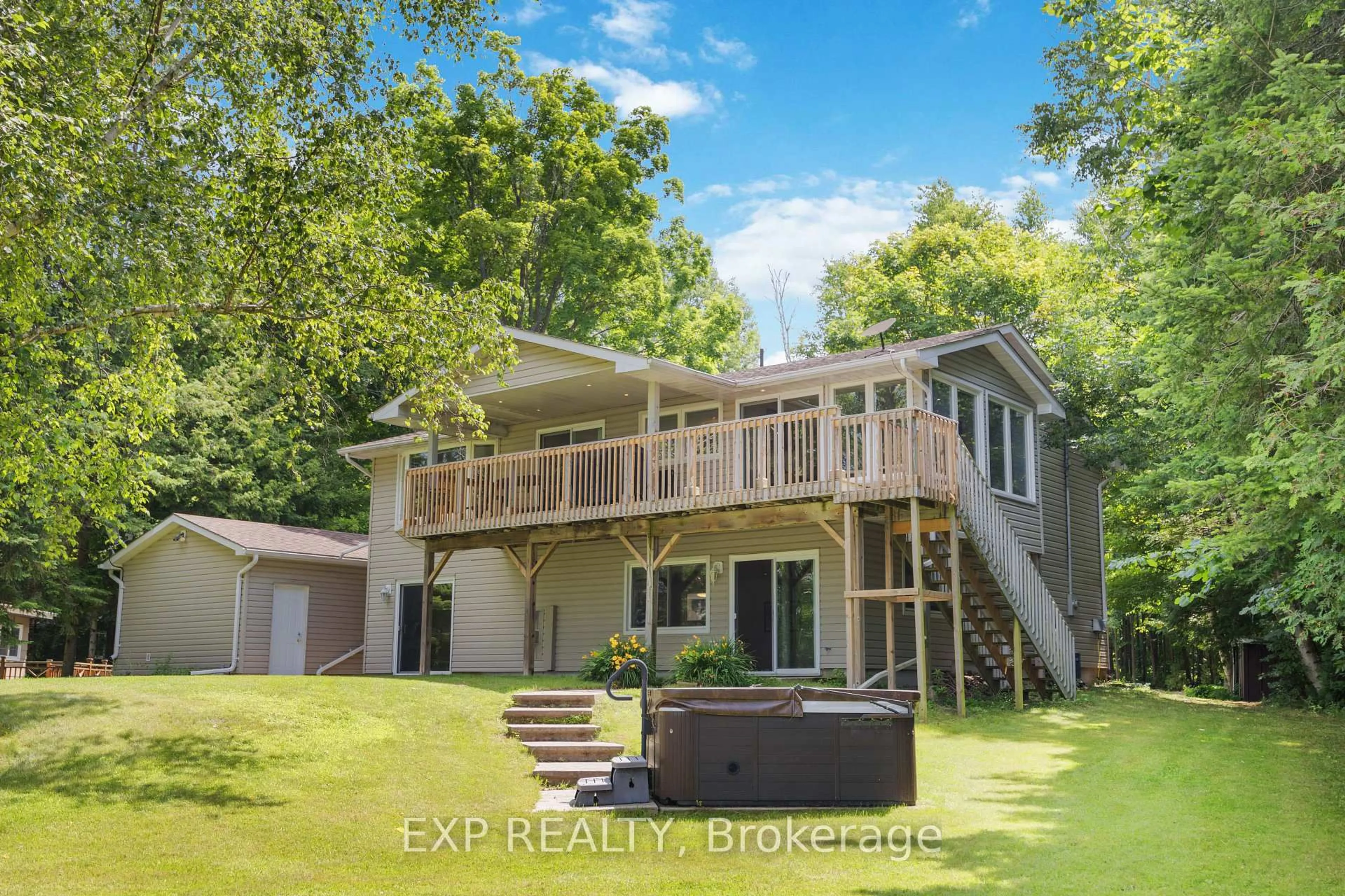 A pic from outside/outdoor area/front of a property/back of a property/a pic from drone, water/lake/river/ocean view for 568 MALLARD Circ, Selwyn Ontario K0L 1T0