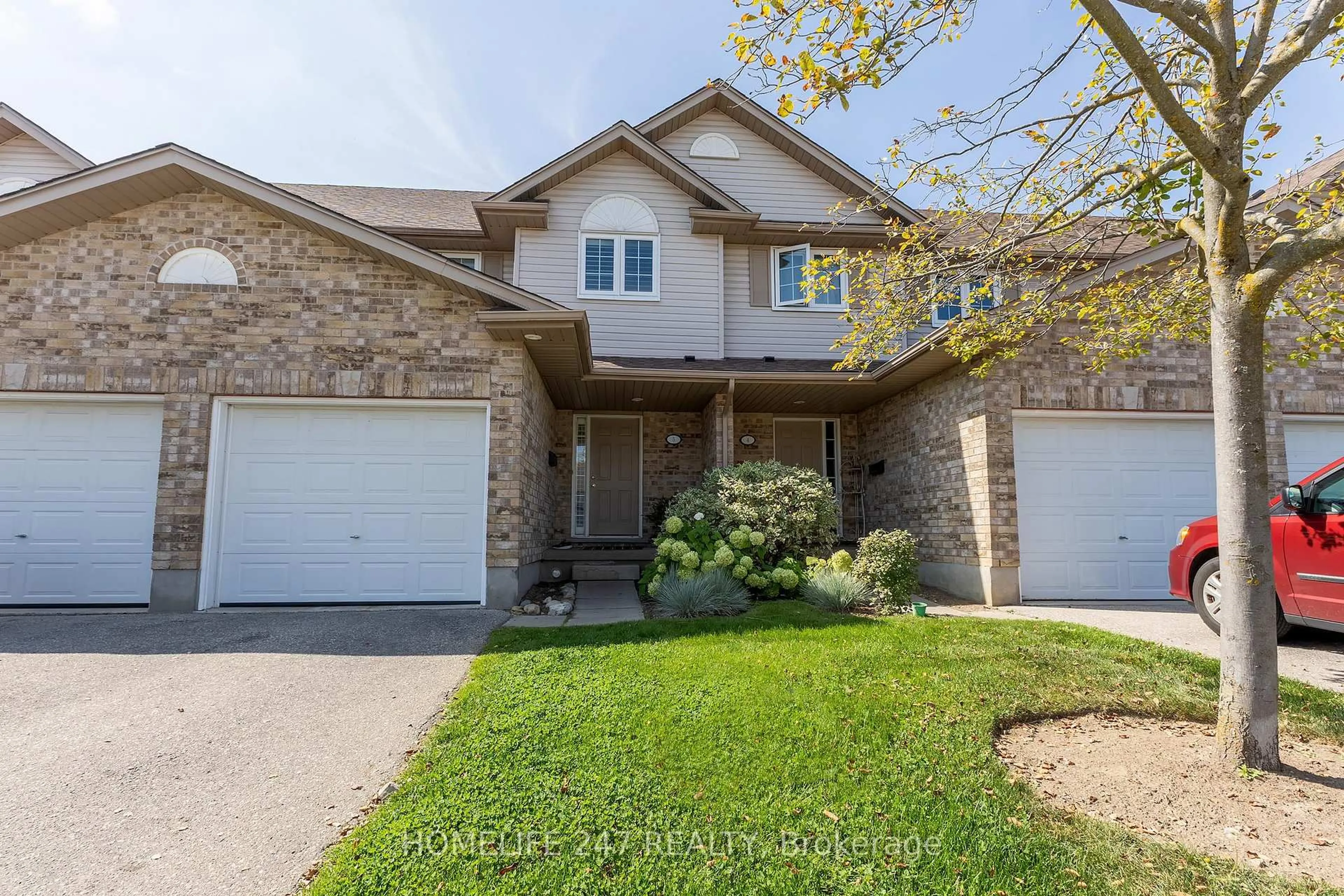 Home with brick exterior material, street for 31 Schroder Cres #5, Guelph Ontario N1E 7M6