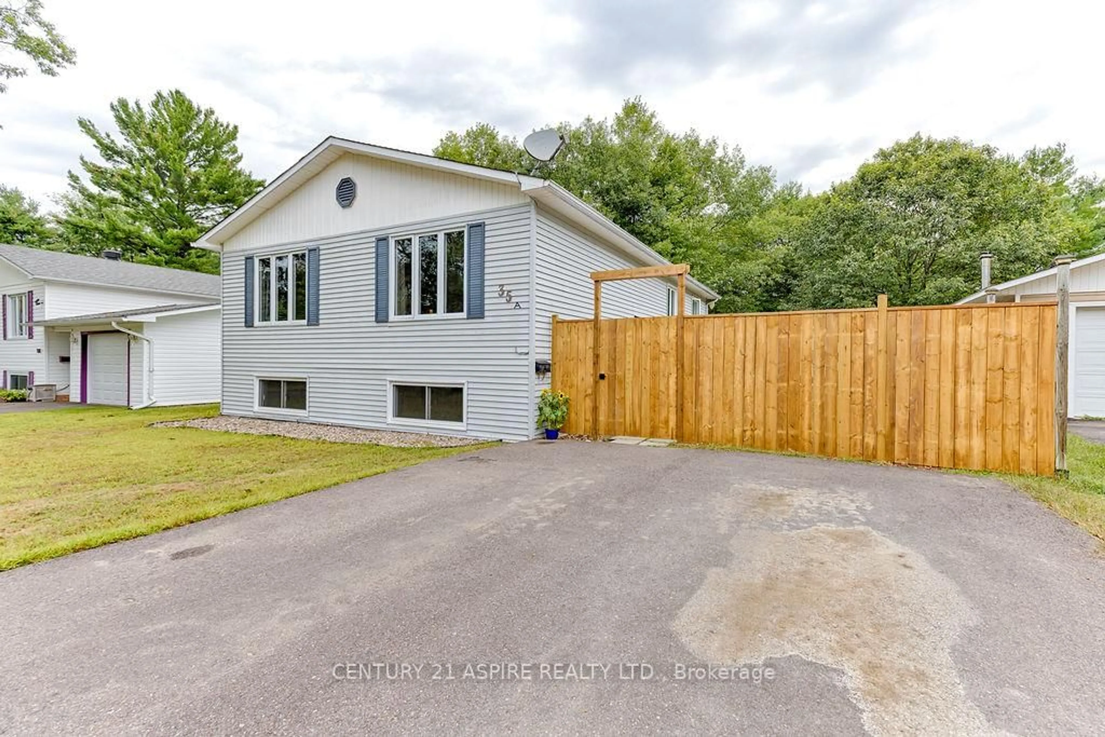 A pic from outside/outdoor area/front of a property/back of a property/a pic from drone, street for 35 A East St, Petawawa Ontario K8H 2N7