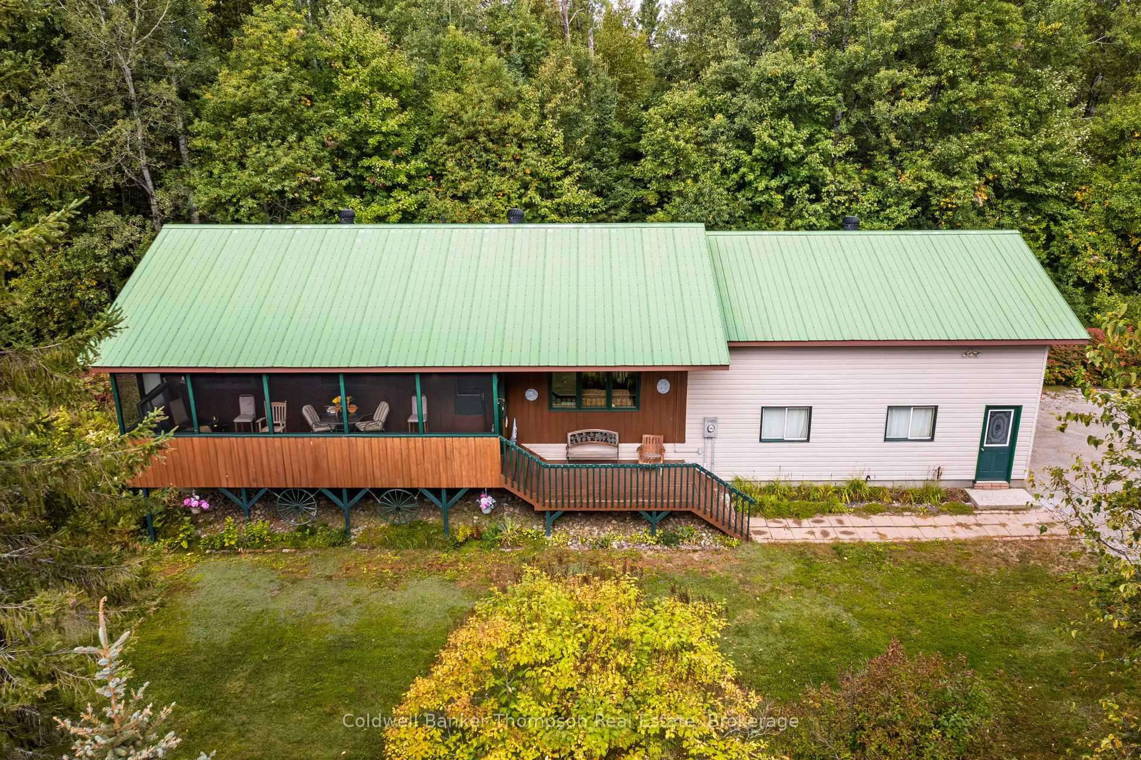 A pic from outside/outdoor area/front of a property/back of a property/a pic from drone, unknown for 66 Rain Lake Rd, Kearney Ontario P0A 1M0