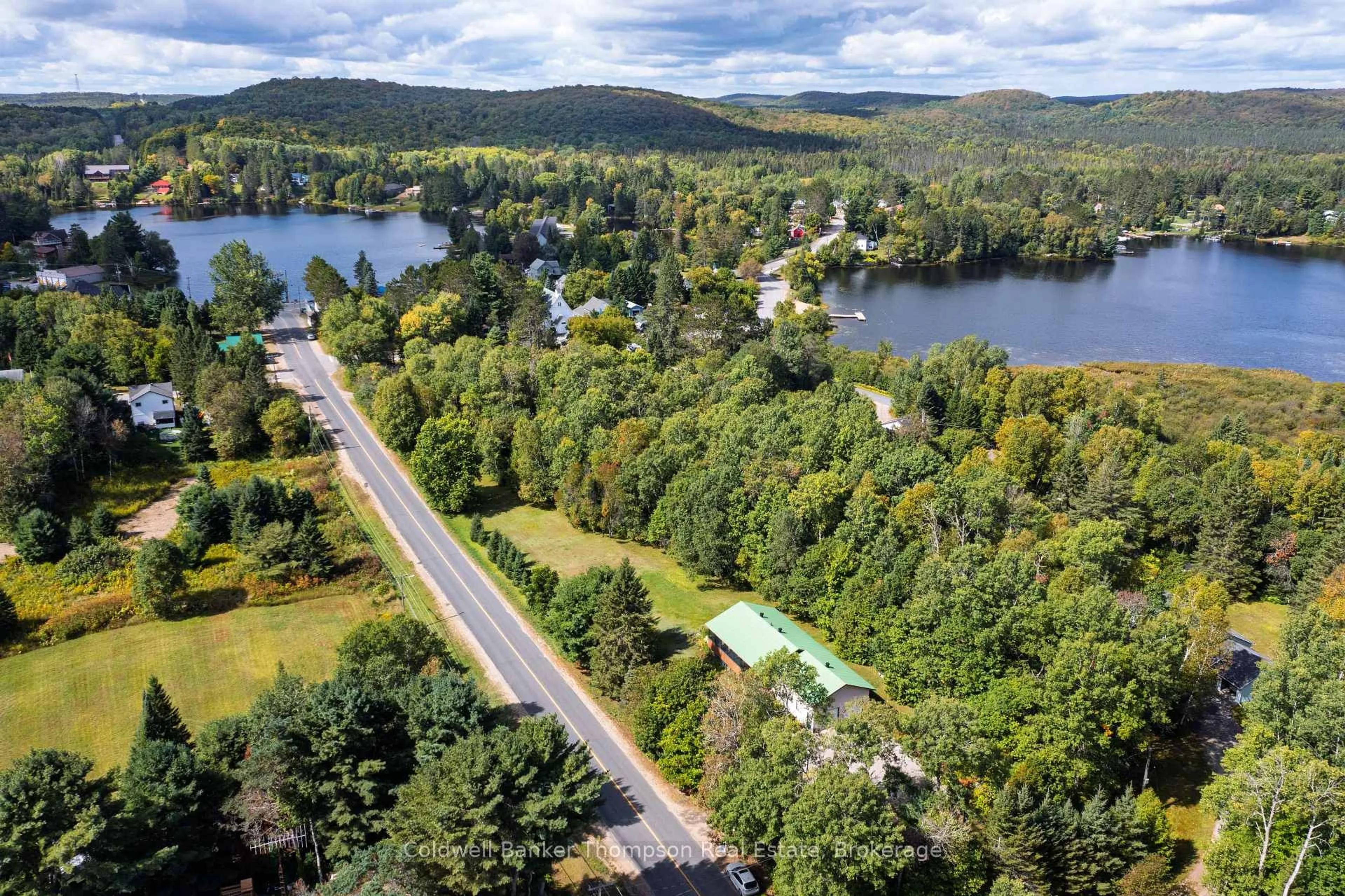 A pic from outside/outdoor area/front of a property/back of a property/a pic from drone, water/lake/river/ocean view for 66 Rain Lake Rd, Kearney Ontario P0A 1M0