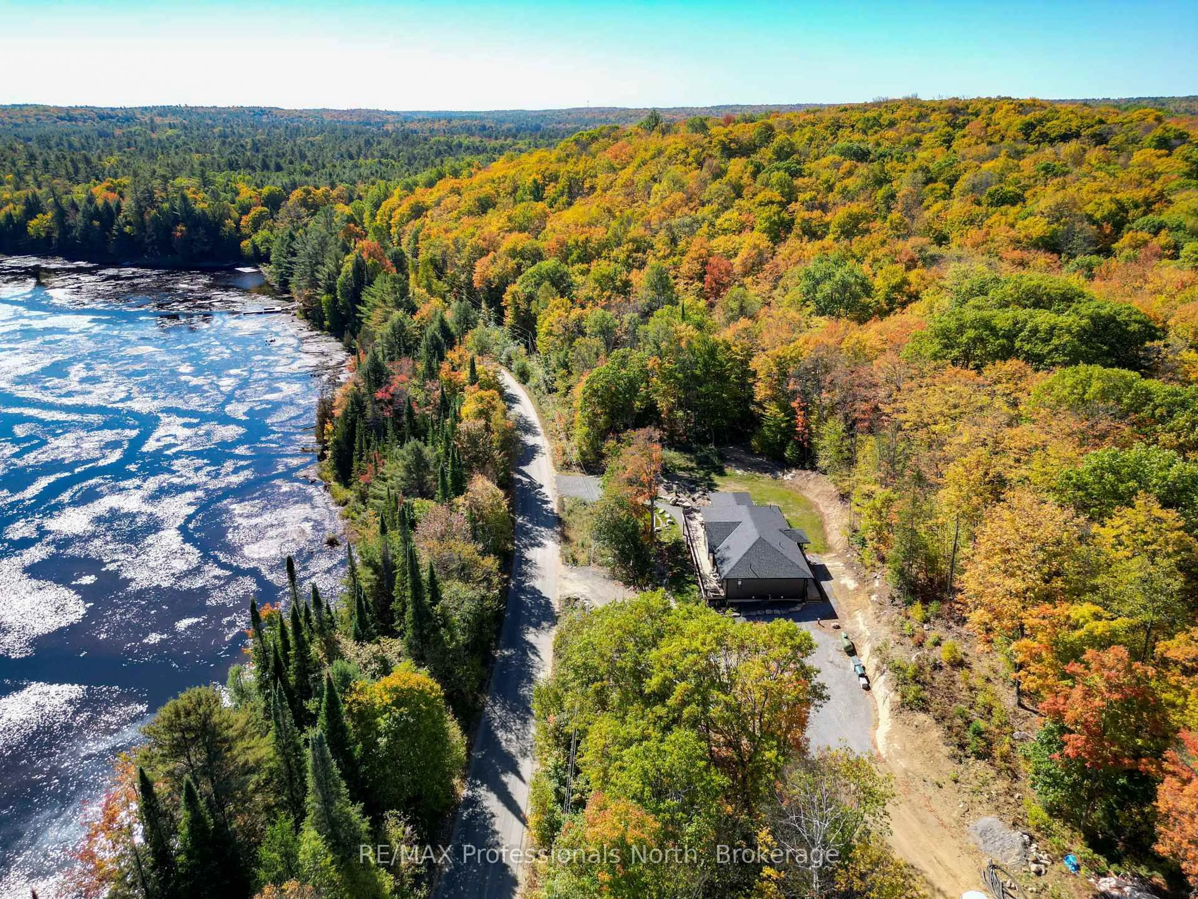 A pic from outside/outdoor area/front of a property/back of a property/a pic from drone, water/lake/river/ocean view for 1203 Burlmarie Rd, Lake of Bays Ontario P0B 1A0