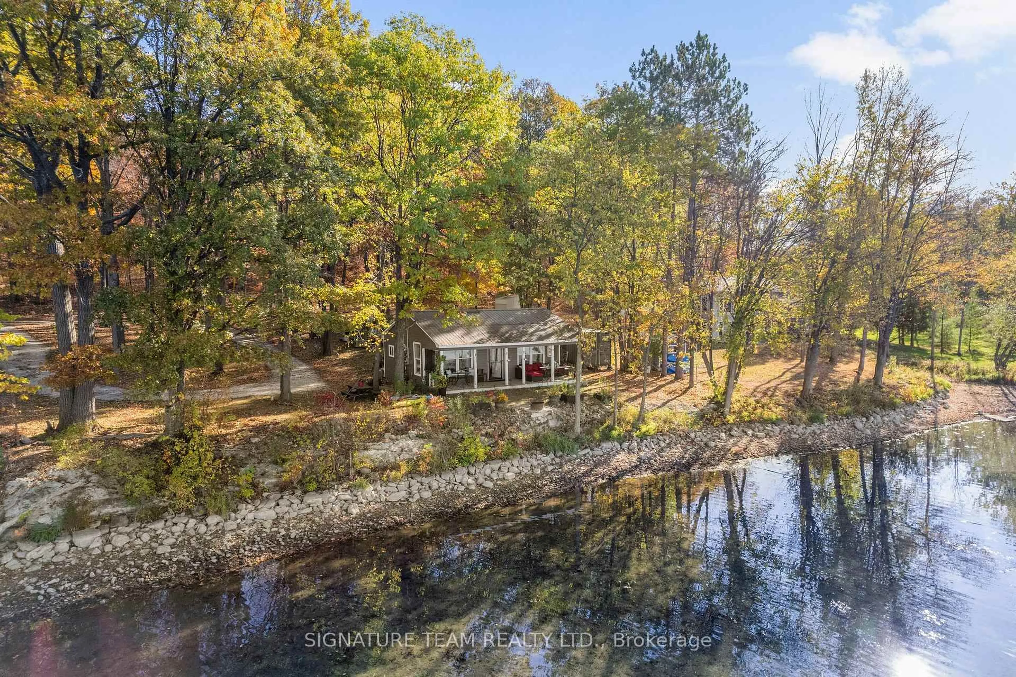 A pic from outside/outdoor area/front of a property/back of a property/a pic from drone, water/lake/river/ocean view for 6 Harlow Tr, Cobden Ontario K0J 1K0