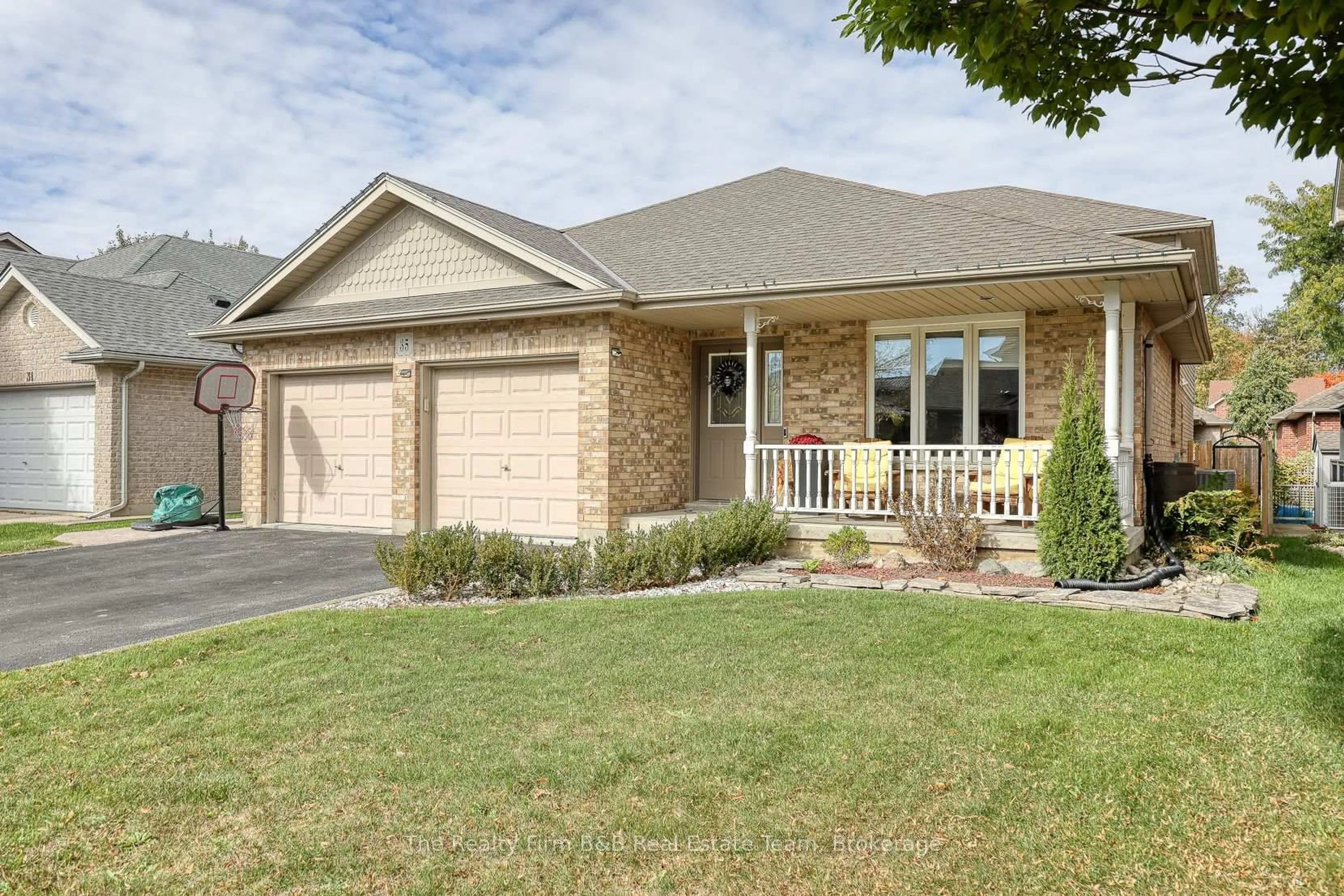 Home with brick exterior material, street for 35 Blue Jay Blvd, Woodstock Ontario N4T 1T2