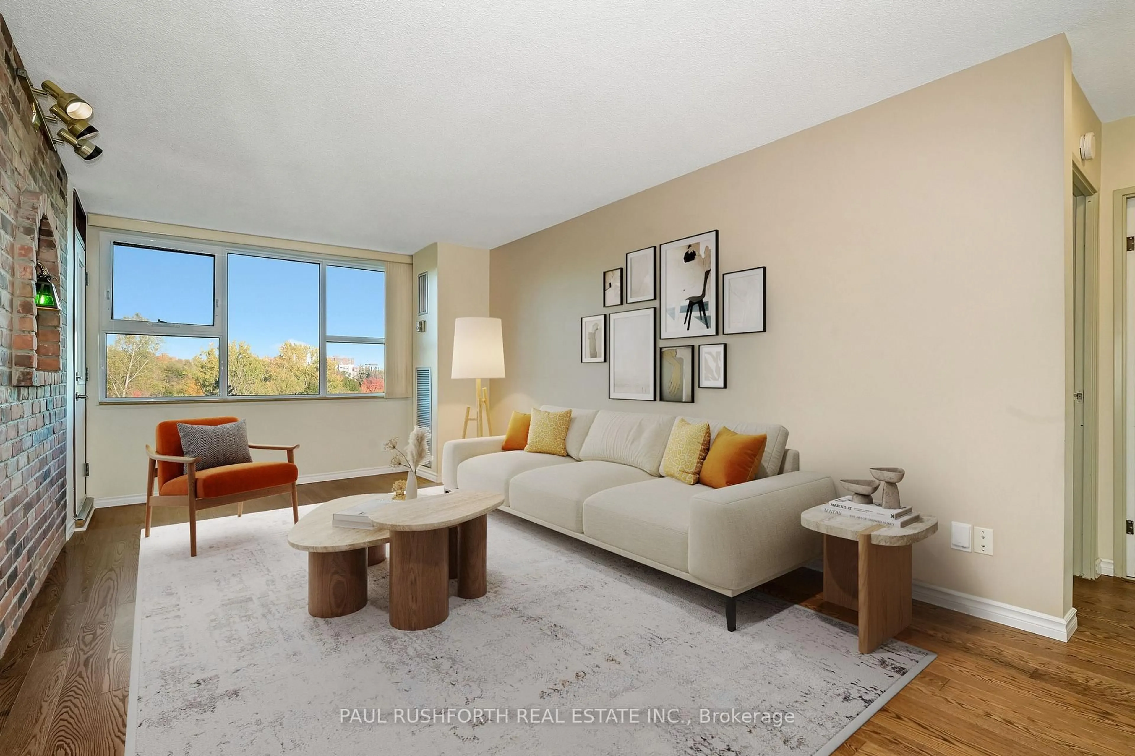 Living room with furniture, unknown for 555 Brittany Dr #707, Ottawa Ontario K1K 4C5