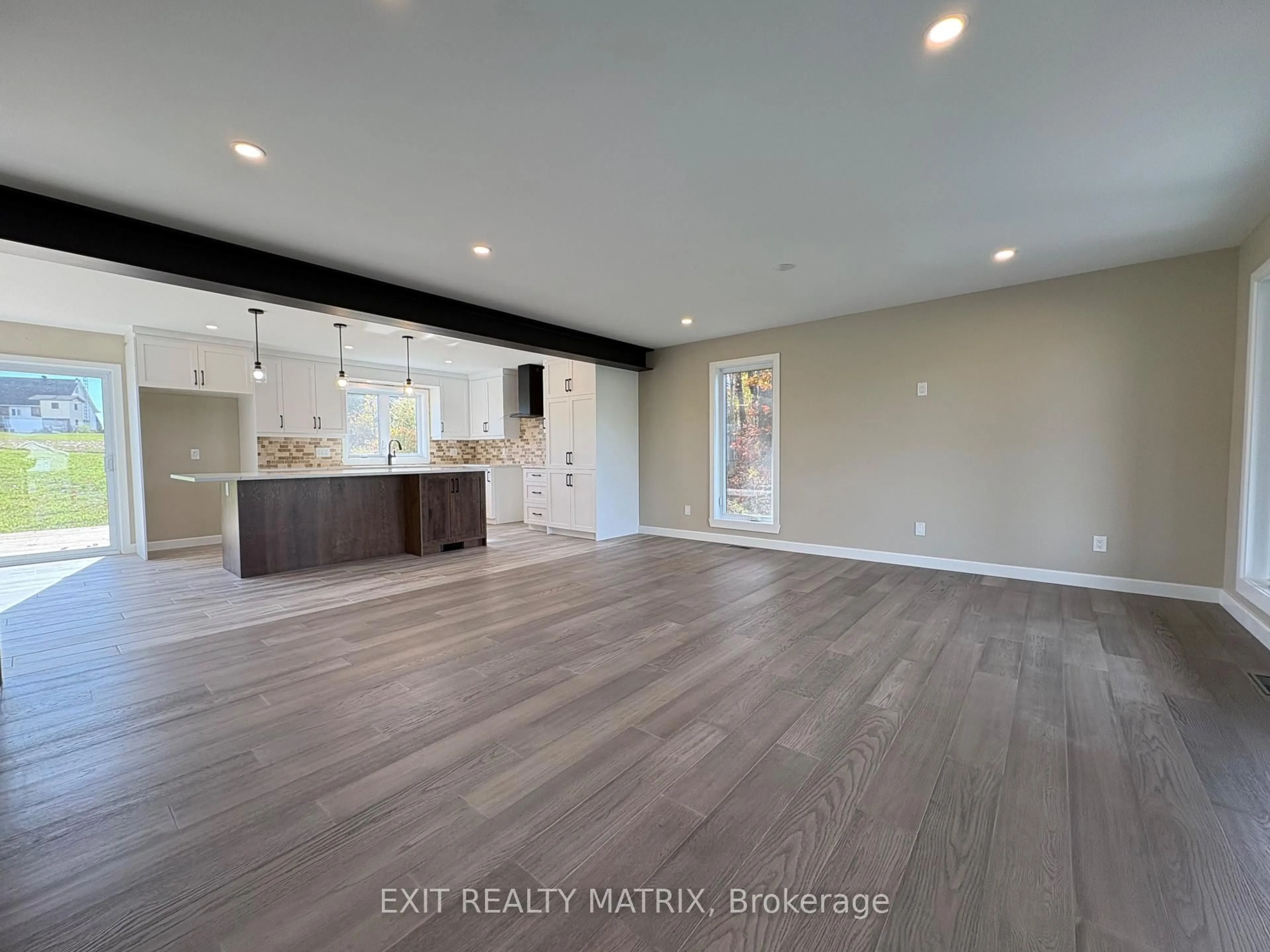 Open concept kitchen, wood/laminate floor for 170 Gascon St, Alfred and Plantagenet Ontario K0B 1J0