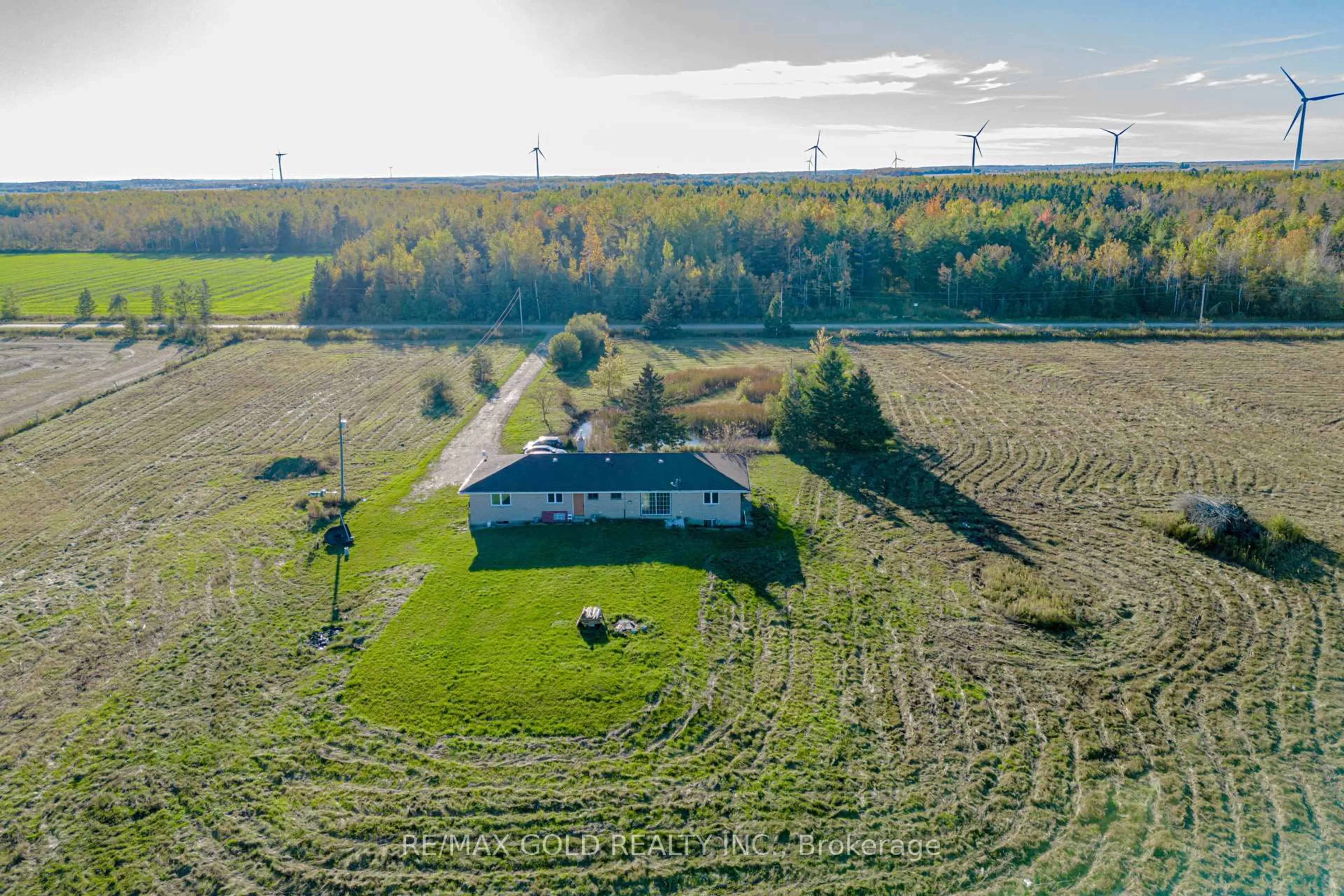 A pic from outside/outdoor area/front of a property/back of a property/a pic from drone, water/lake/river/ocean view for 255505 9th Line, Amaranth Ontario L0N 1S5