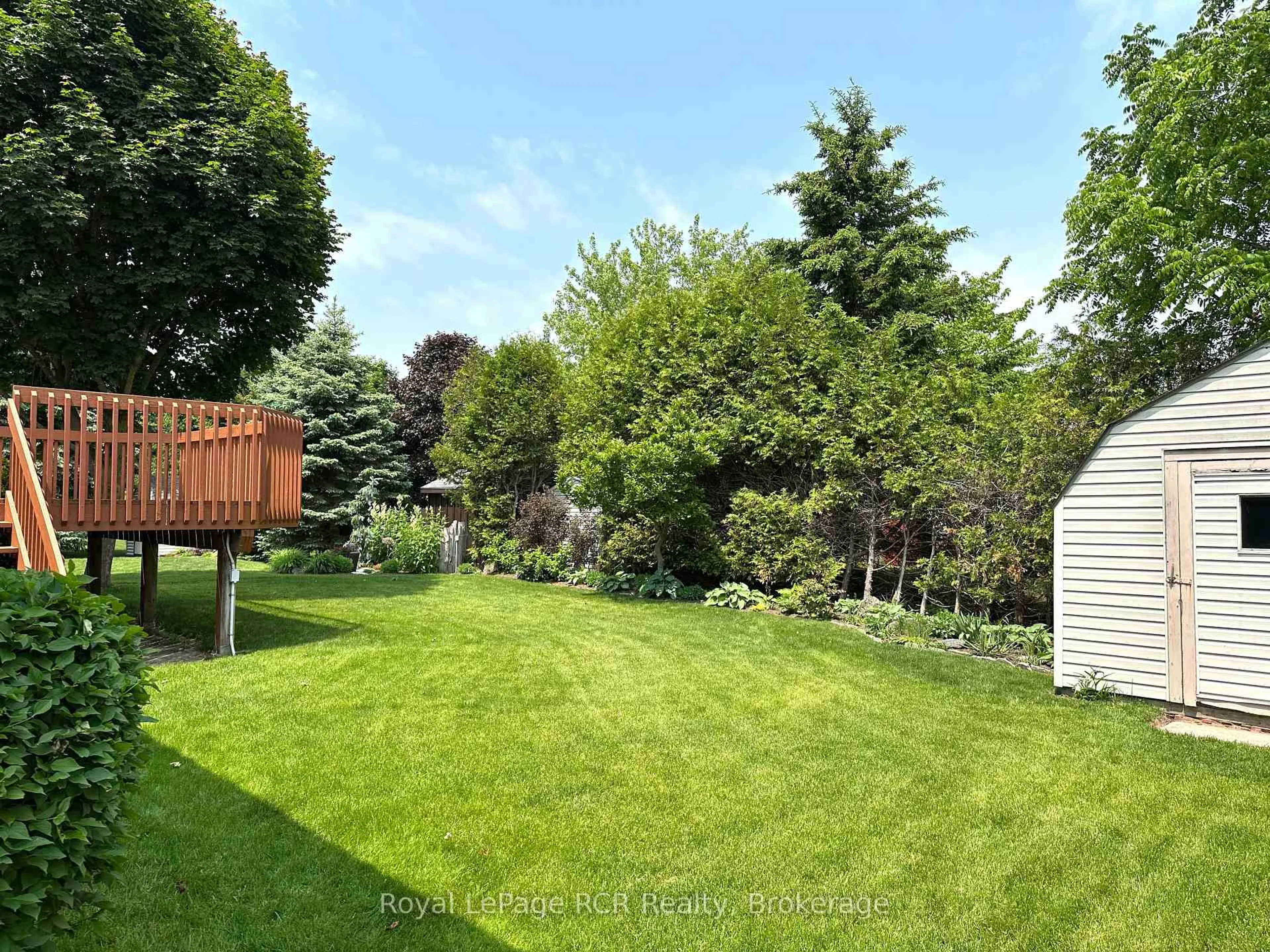 A pic from outside/outdoor area/front of a property/back of a property/a pic from drone, forest/trees view for 218 4th Street Cres, Hanover Ontario N4N 3S2