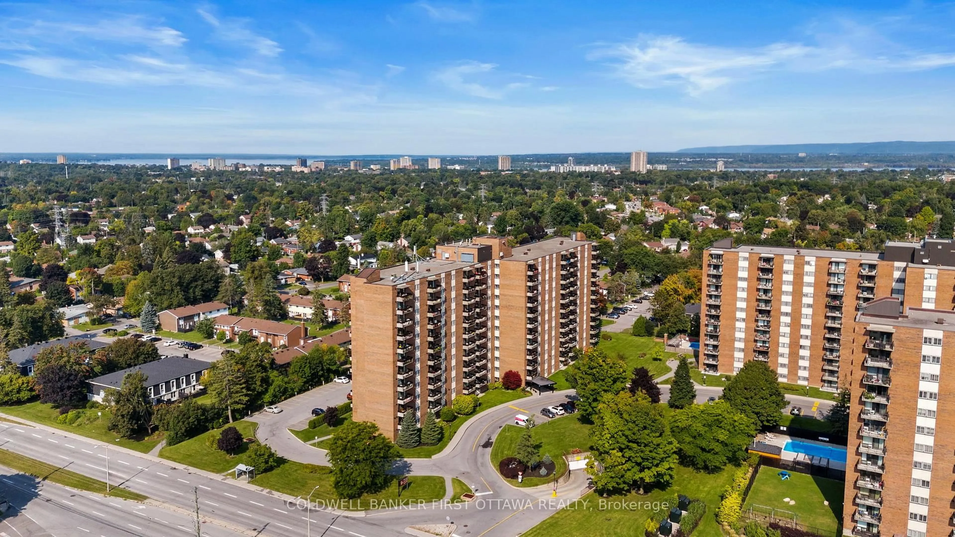 A pic from outside/outdoor area/front of a property/back of a property/a pic from drone, city buildings view from balcony for 1505 Baseline Rd #913, Ottawa Ontario K2C 3L4