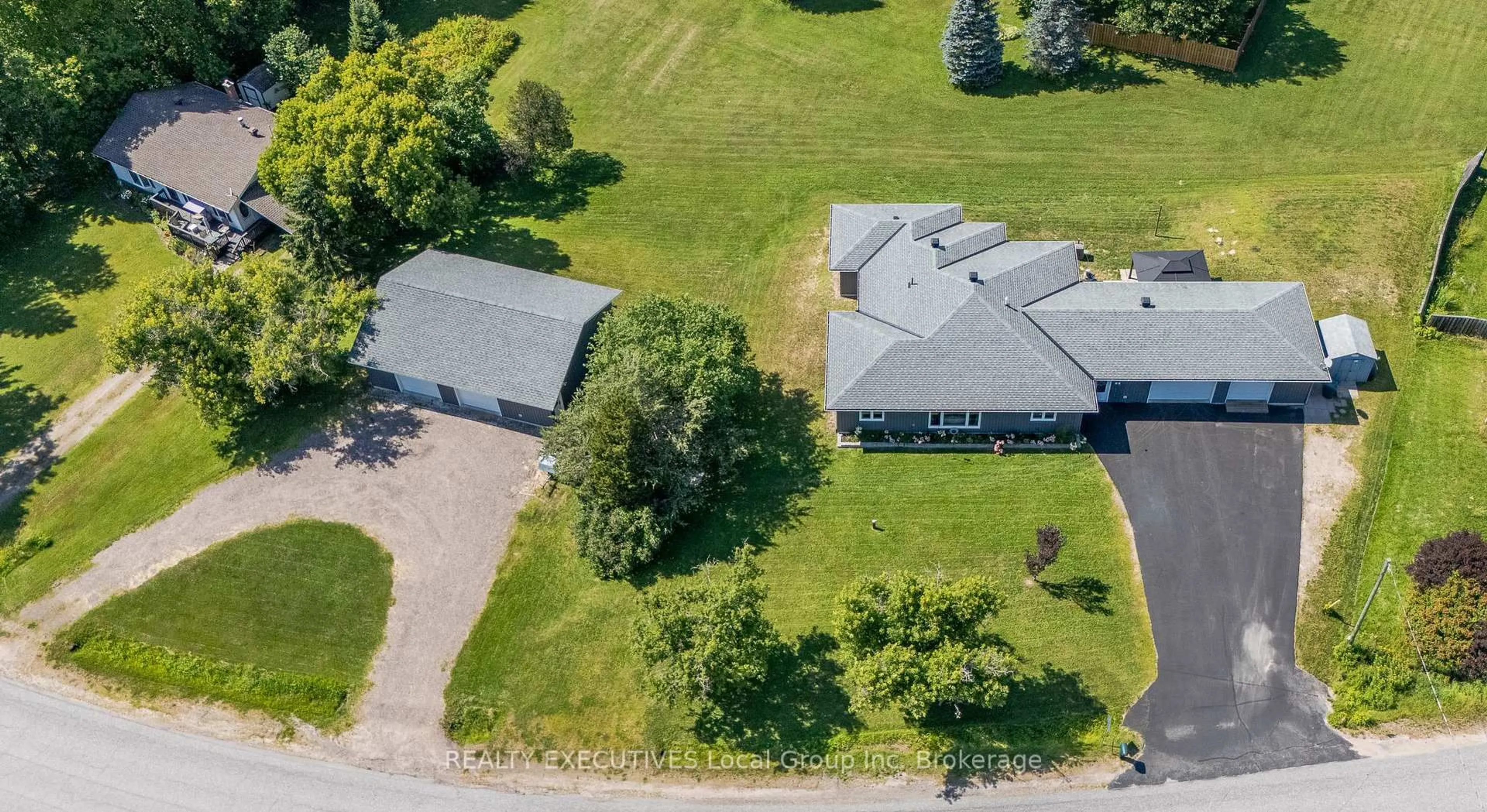 A pic from outside/outdoor area/front of a property/back of a property/a pic from drone, street for 98 Memorial Park Dr, Powassan Ontario P0H 1Z0