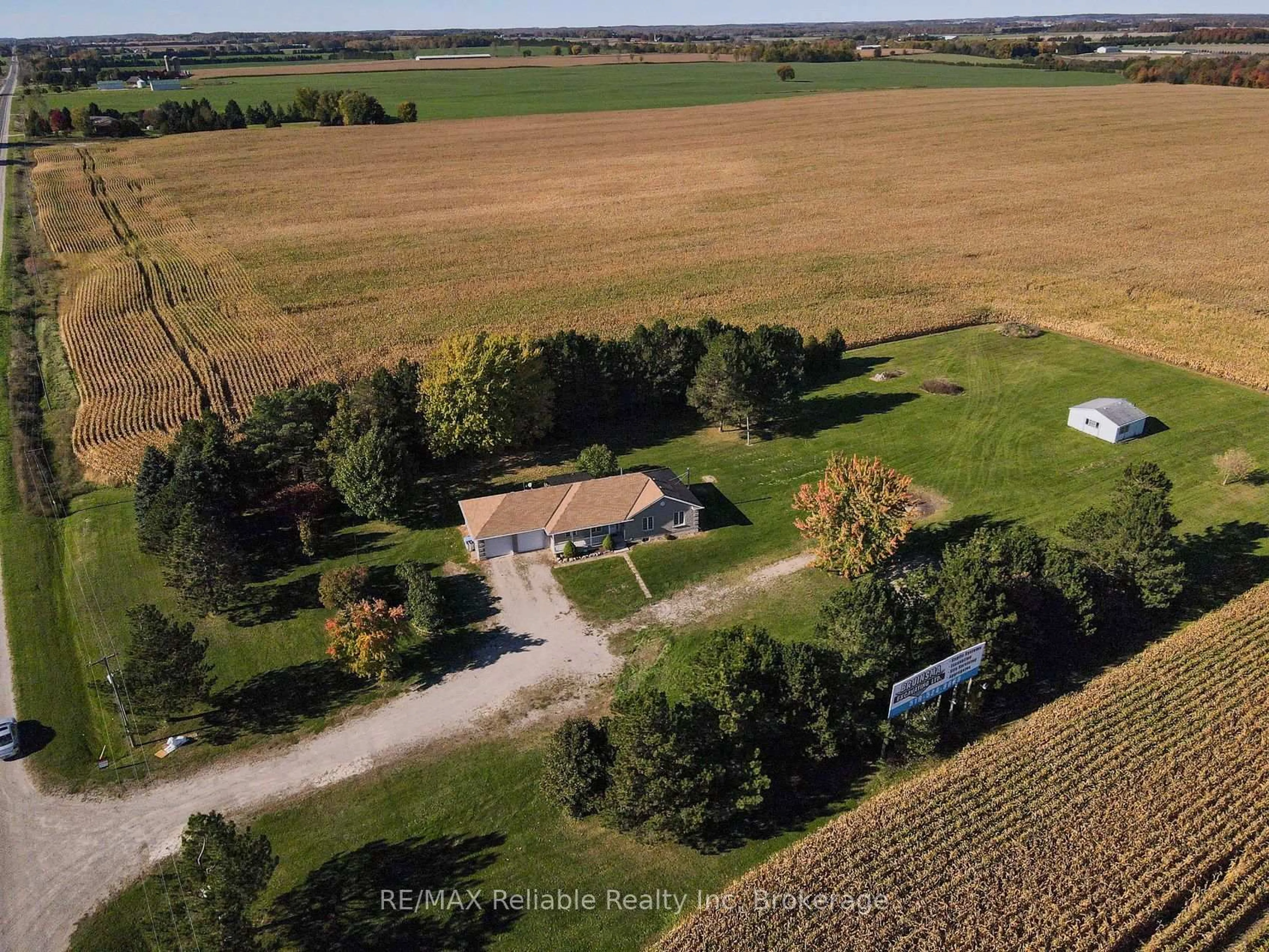 A pic from outside/outdoor area/front of a property/back of a property/a pic from drone, street for 42248 Huron Road, Rural Route # 2 Rd, Huron East Ontario N0K 1W0