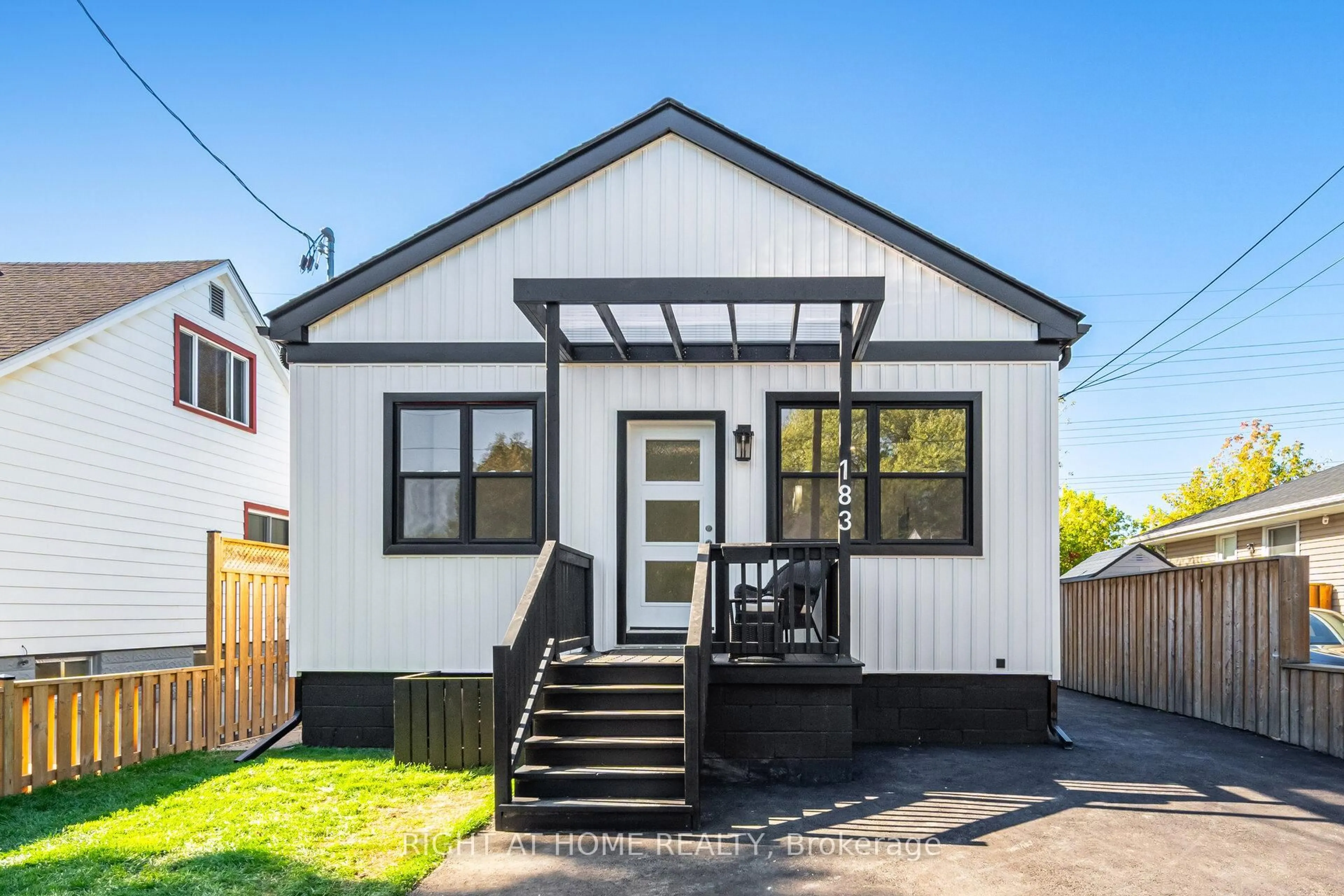 Home with vinyl exterior material, street for 183 Normanhurst Ave, Hamilton Ontario L8H 5M9
