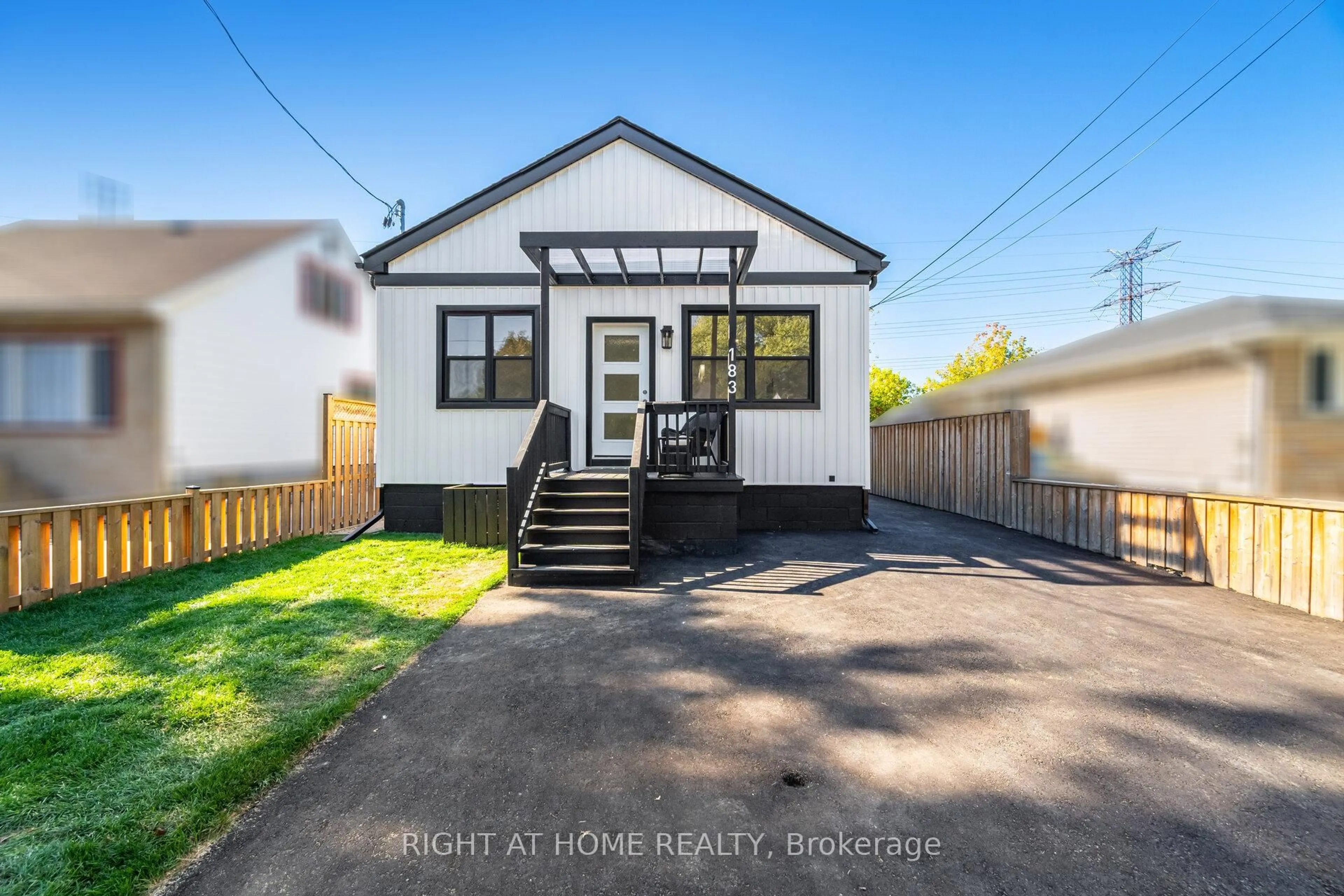 Home with vinyl exterior material, street for 183 Normanhurst Ave, Hamilton Ontario L8H 5M9