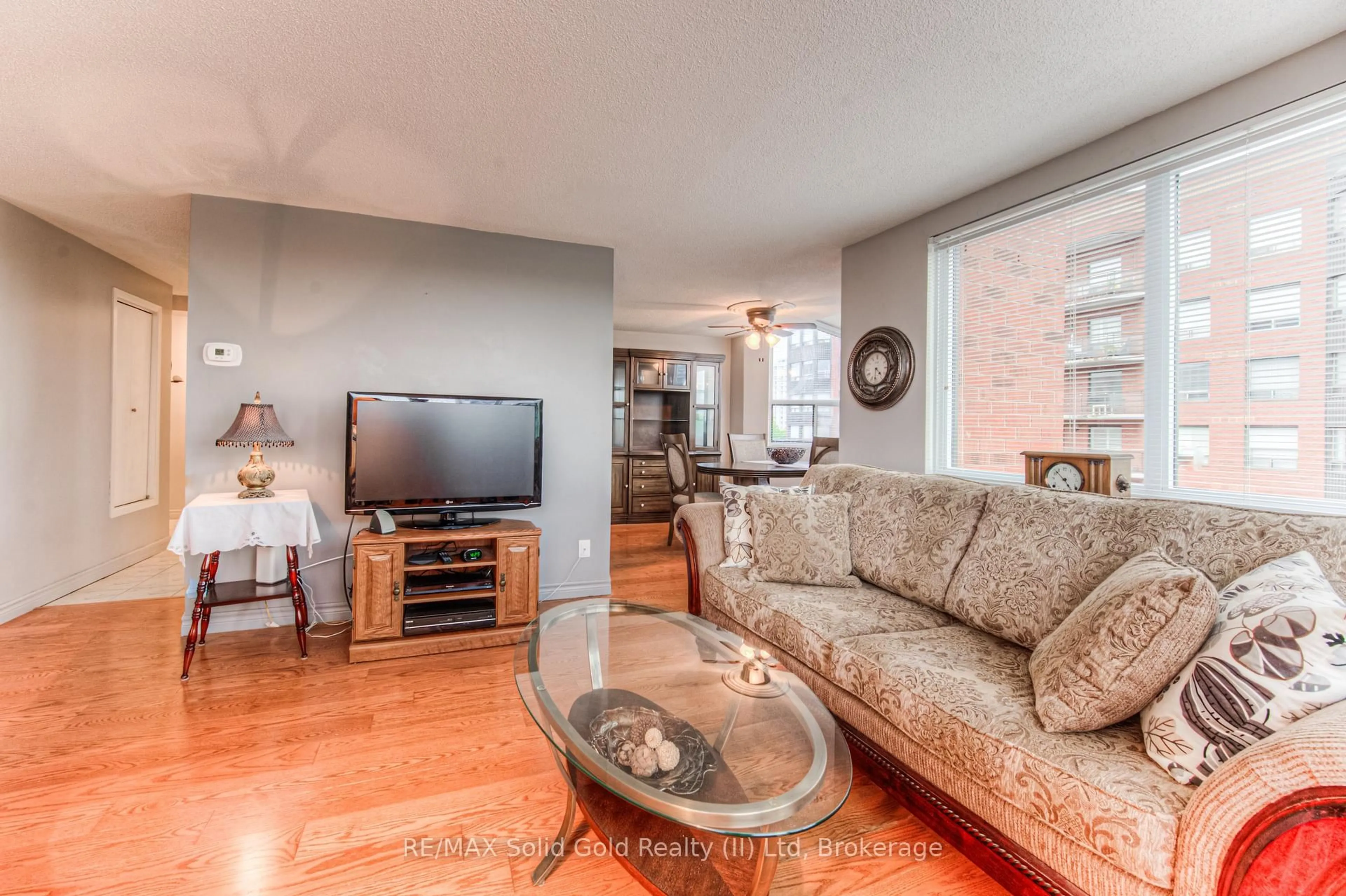 Living room with furniture, unknown for 20 Ellen St #611, Kitchener Ontario N2H 6R7