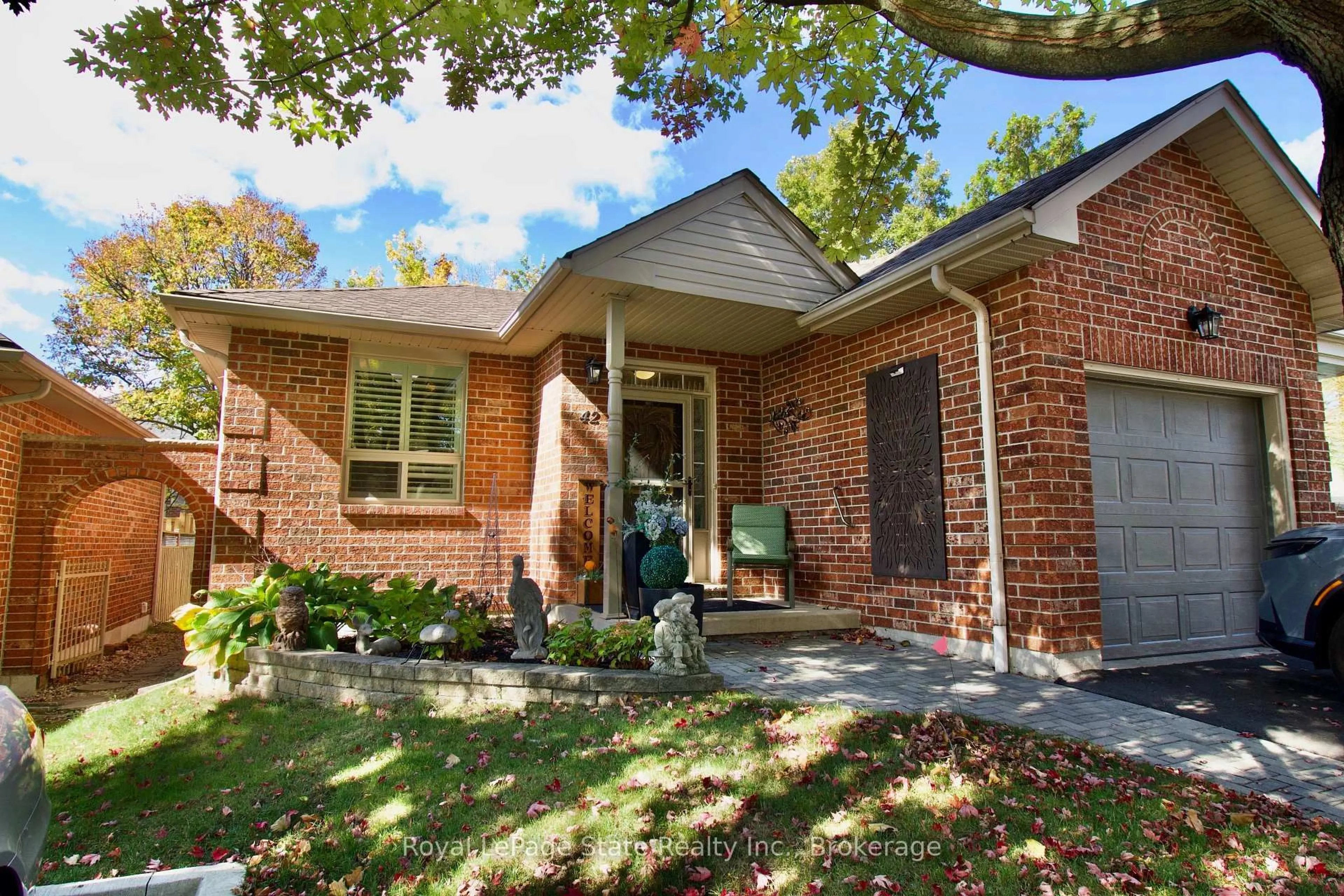 Home with brick exterior material, street for 42 Greentrail Dr, Hamilton Ontario L0R 1W0