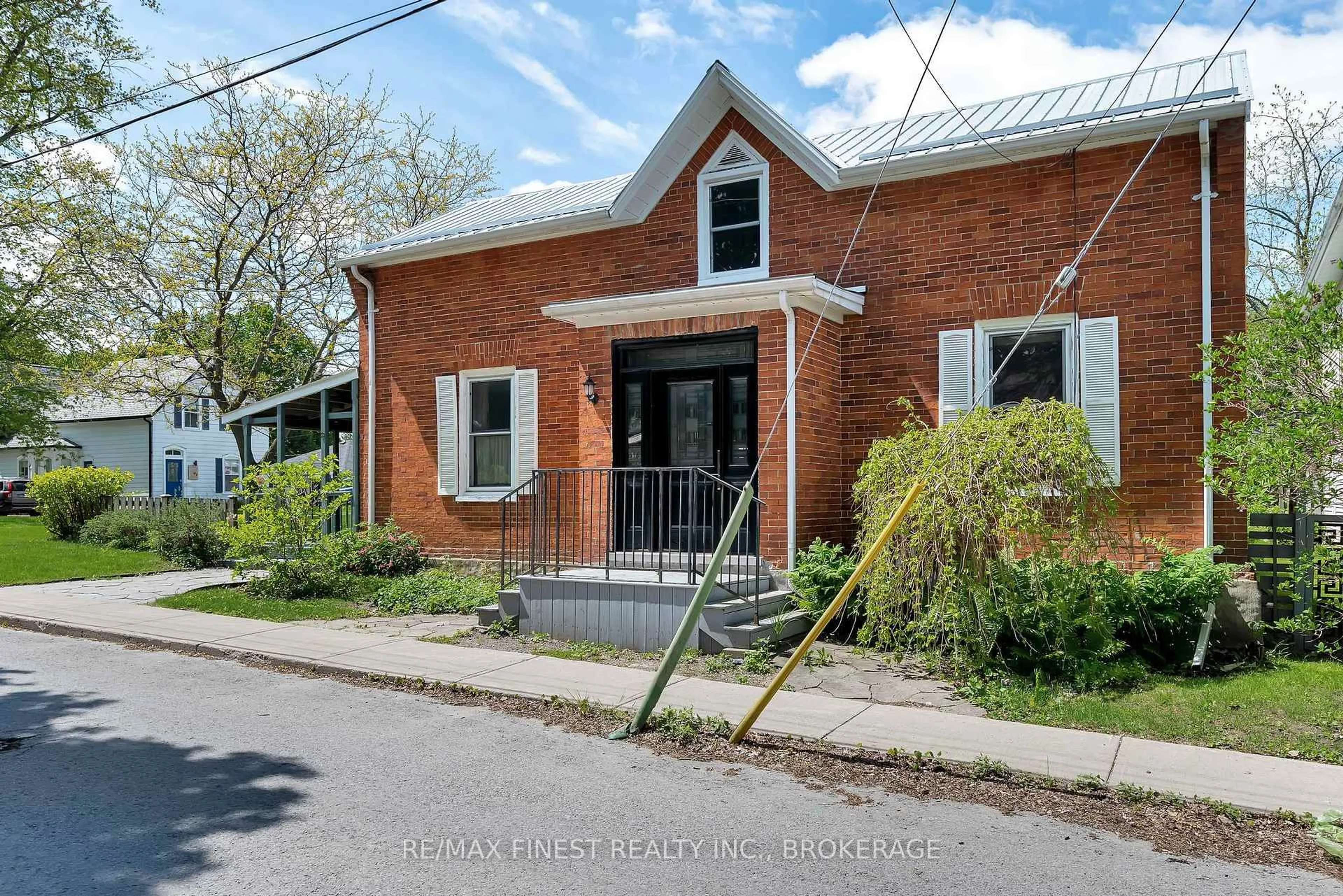 Home with brick exterior material, street for 8 Catherine St, Prince Edward County Ontario K0K 2T0