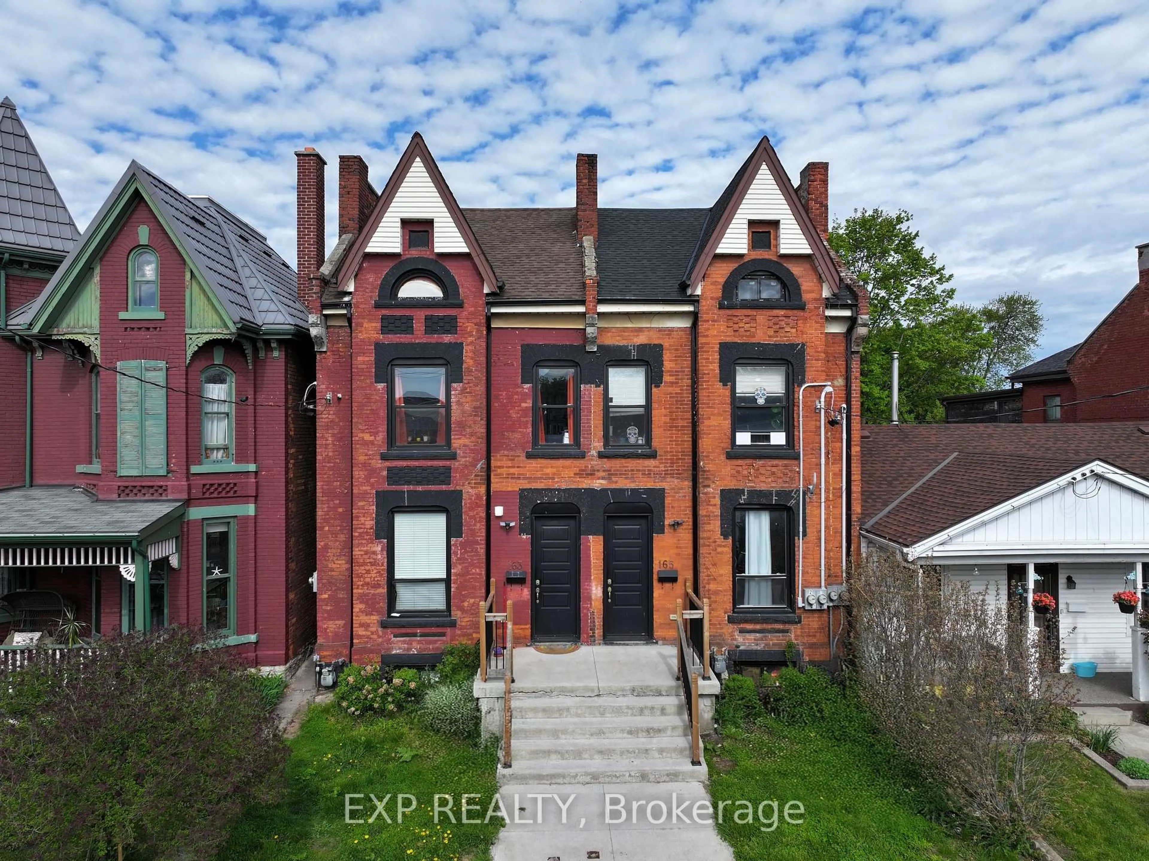 Home with brick exterior material, building for 163 Emerald St, Hamilton Ontario L8L 5K9