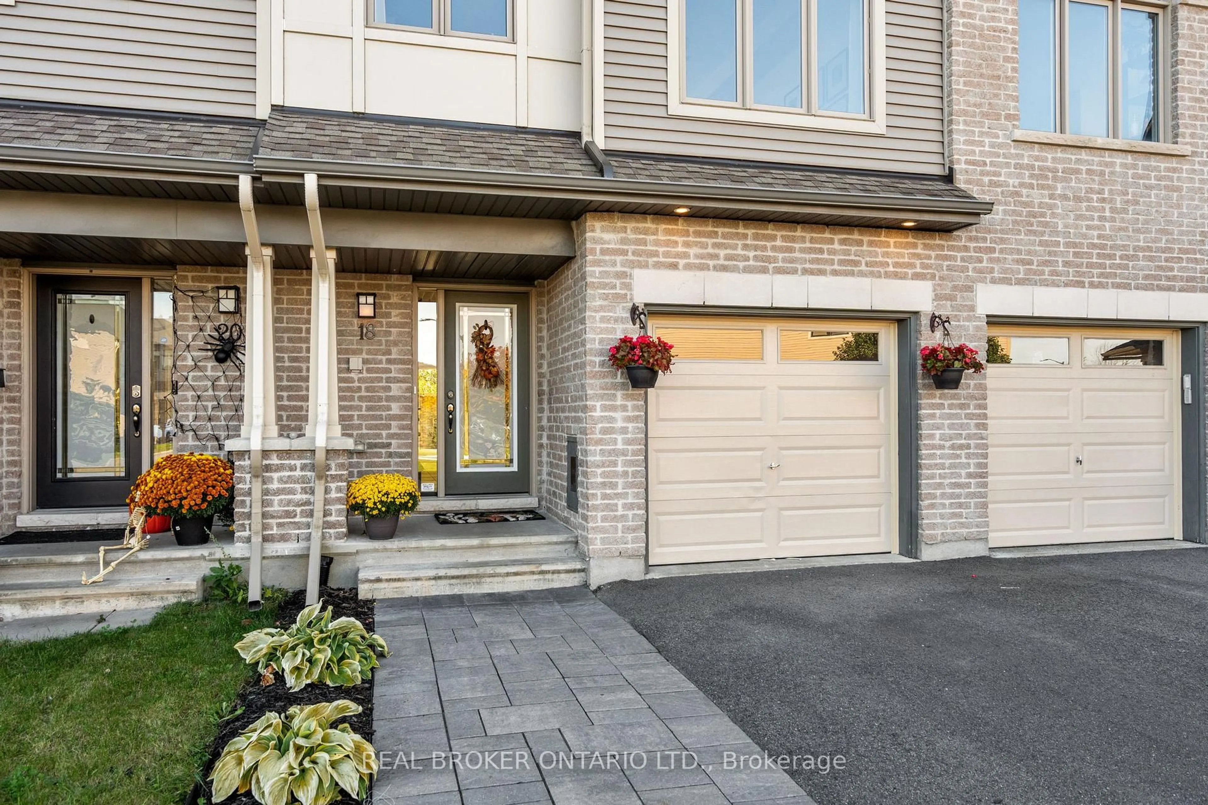 Home with brick exterior material, street for 18 Barn Swallow Private, Ottawa Ontario K4M 0H5