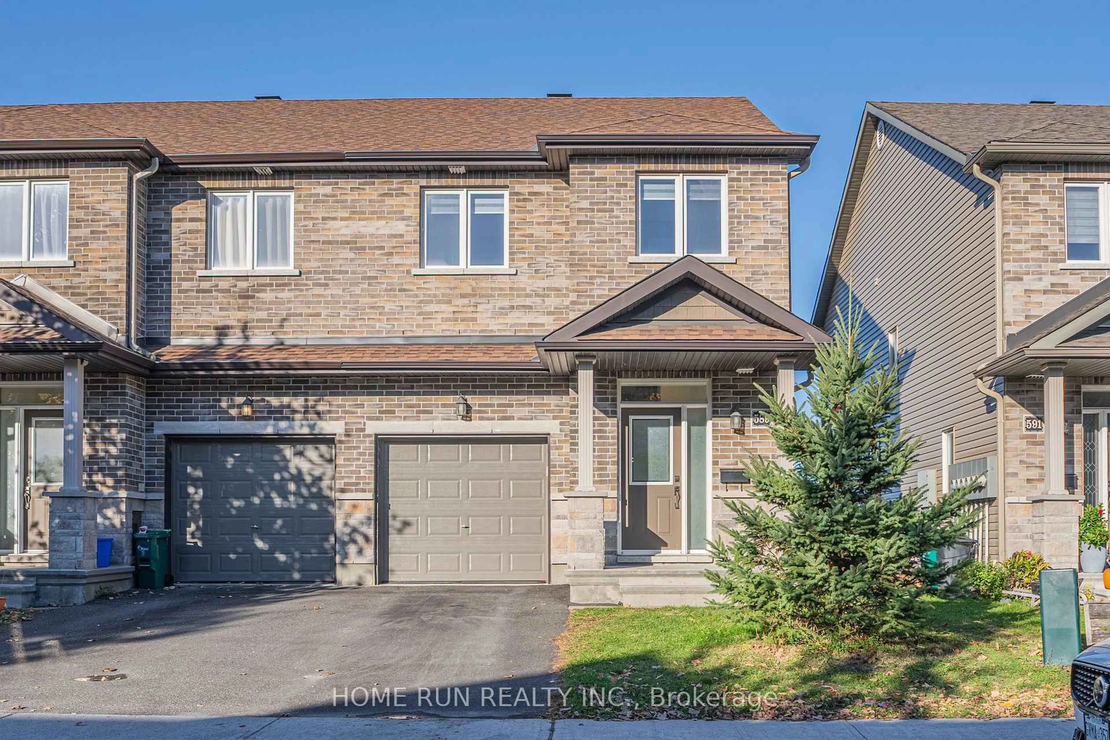 Home with brick exterior material, street for 589 Via Mattino Way, Nepean Ontario K2J 6B8