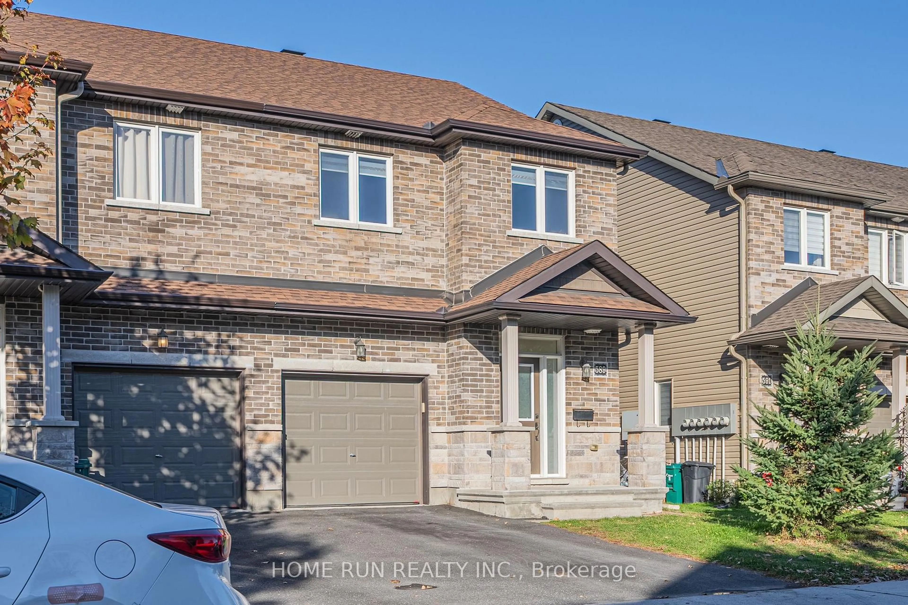 Home with brick exterior material, street for 589 Via Mattino Way, Nepean Ontario K2J 6B8