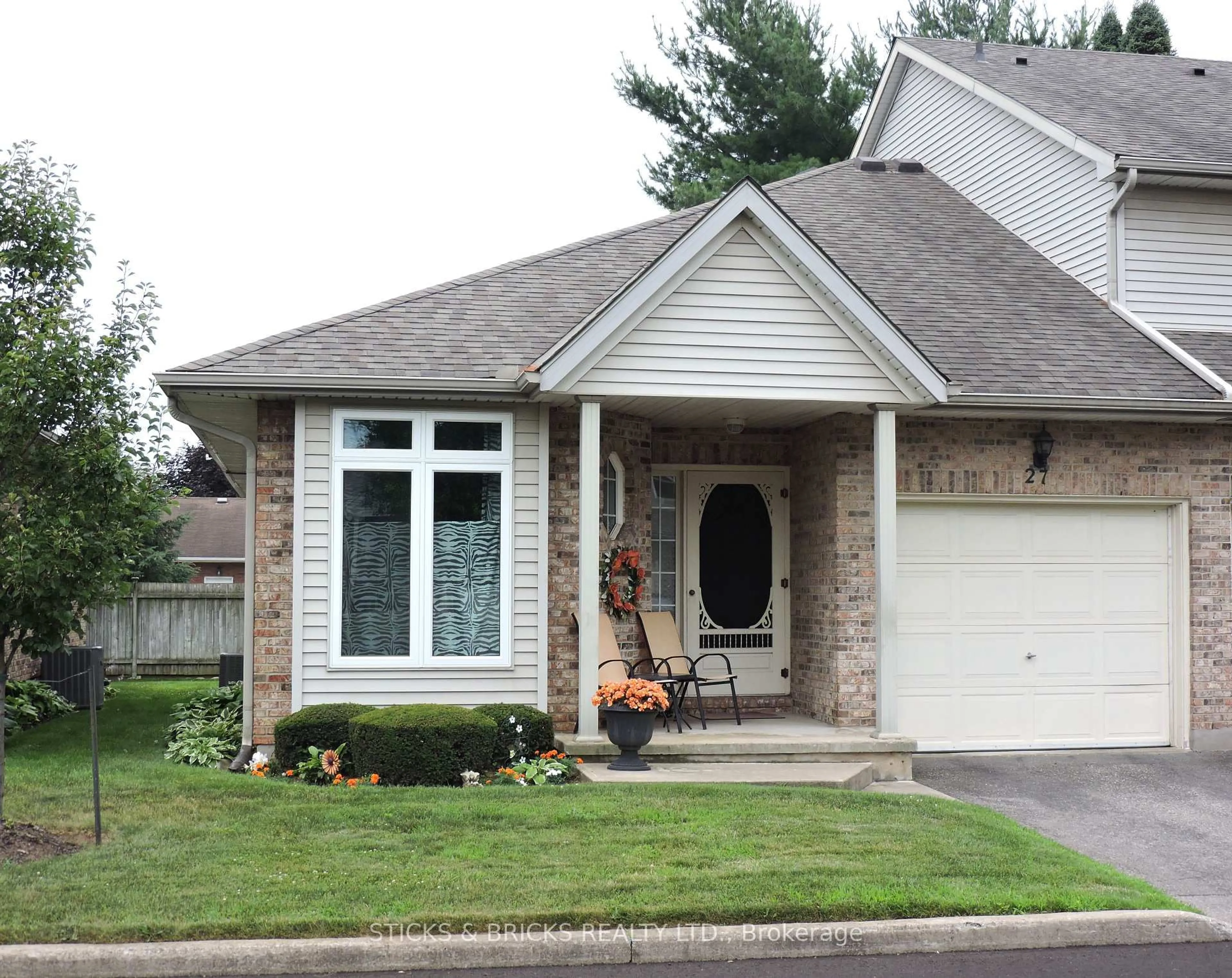 Home with brick exterior material, street for 5070 Drummond Rd #27, Niagara Falls Ontario L2E 6E4