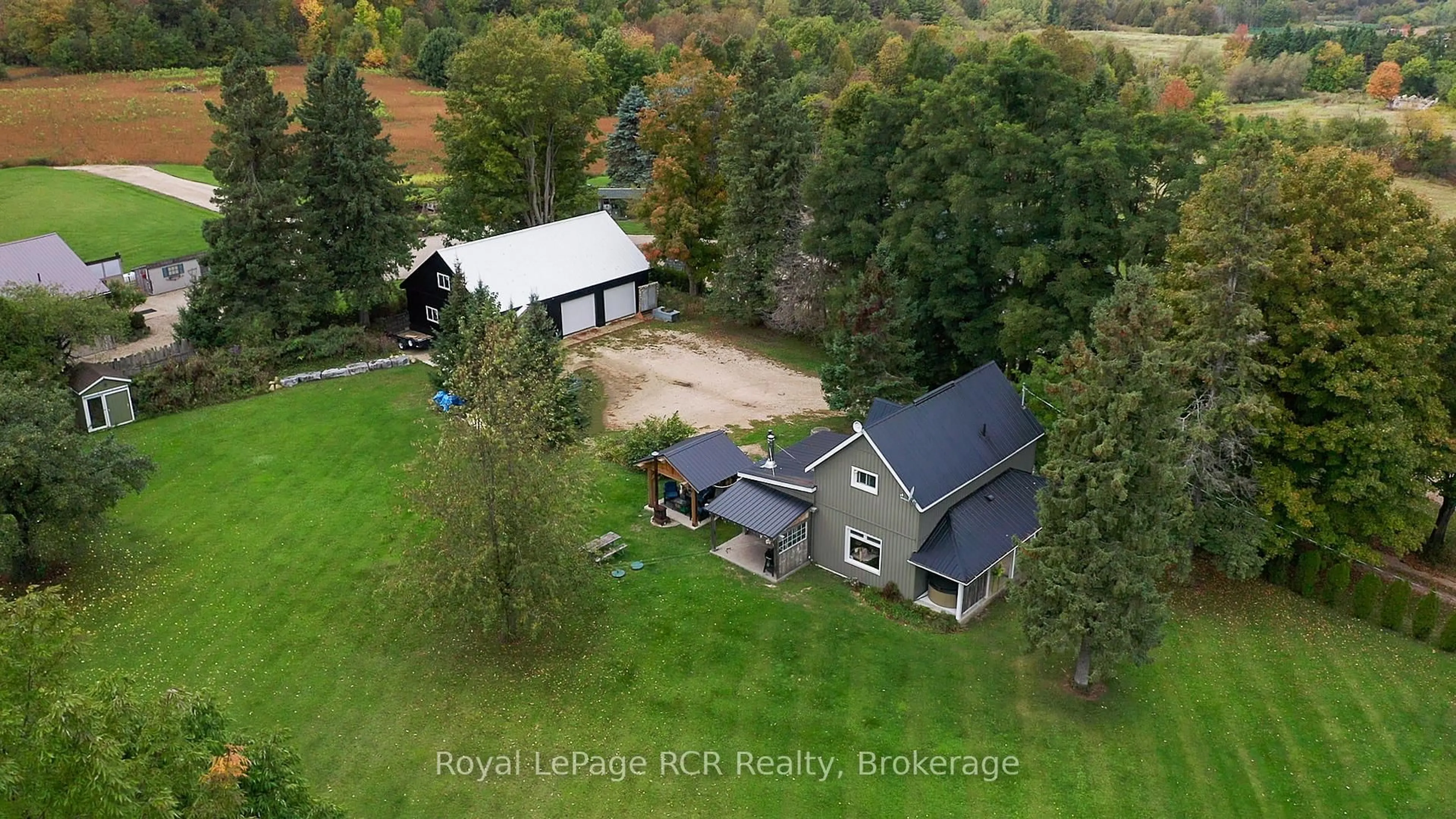 A pic from outside/outdoor area/front of a property/back of a property/a pic from drone, unknown for 773760 Highway 10, Grey Highlands Ontario N0C 1L0