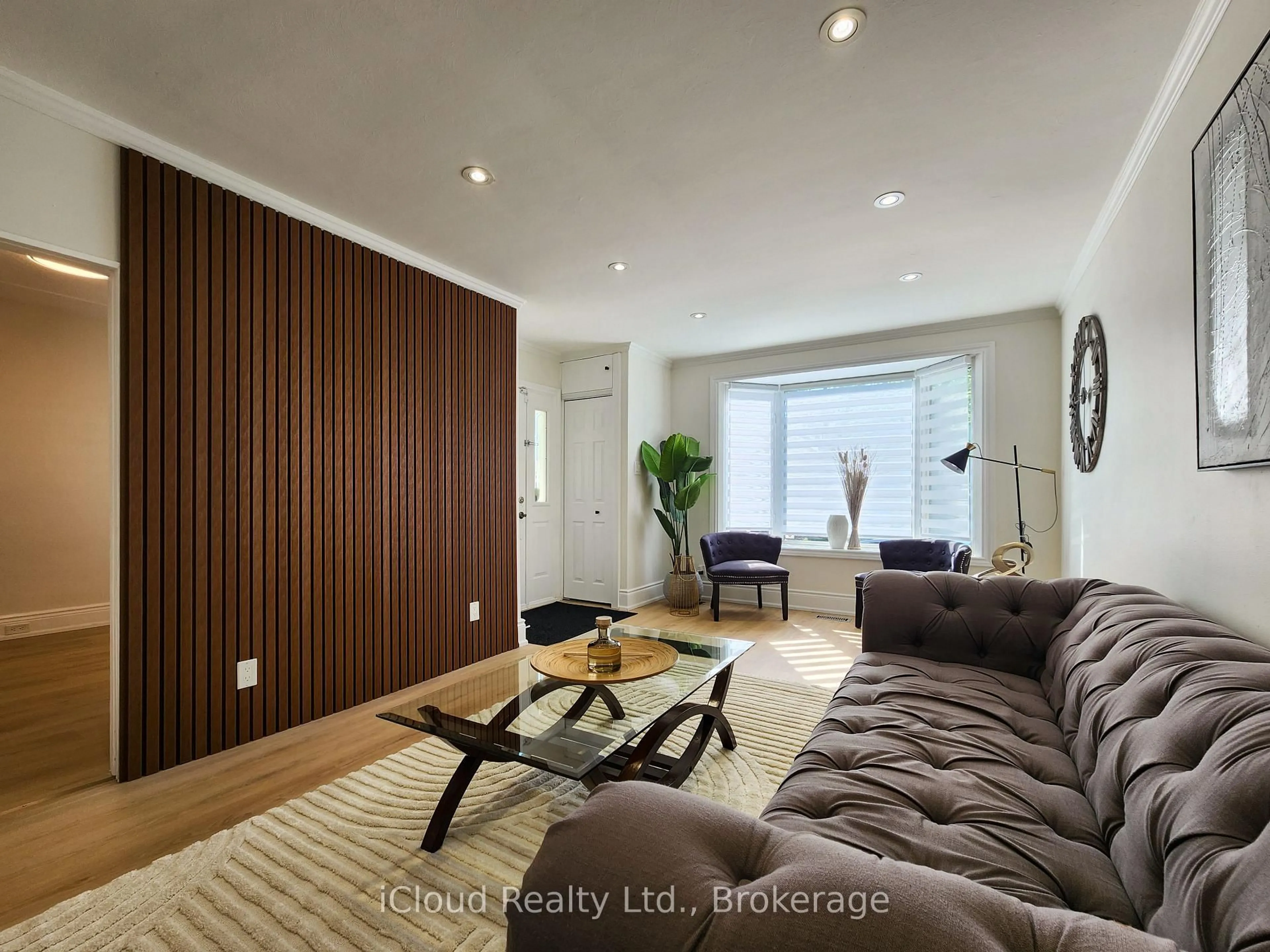 Living room with furniture, wood/laminate floor for 294 Fairfield Ave, Hamilton Ontario L8H 5H6