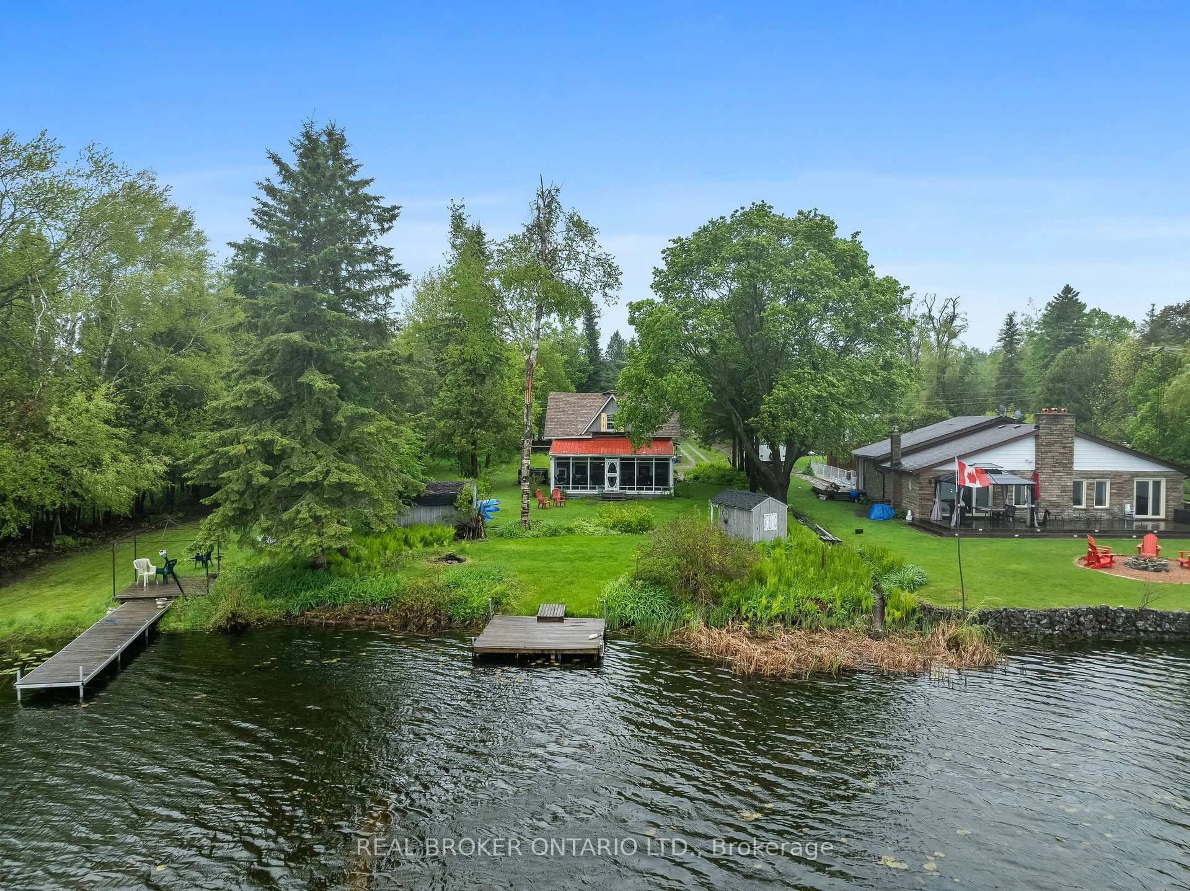 A pic from outside/outdoor area/front of a property/back of a property/a pic from drone, water/lake/river/ocean view for 70 Cowans Cres, Kawartha Lakes Ontario K0L 2W0