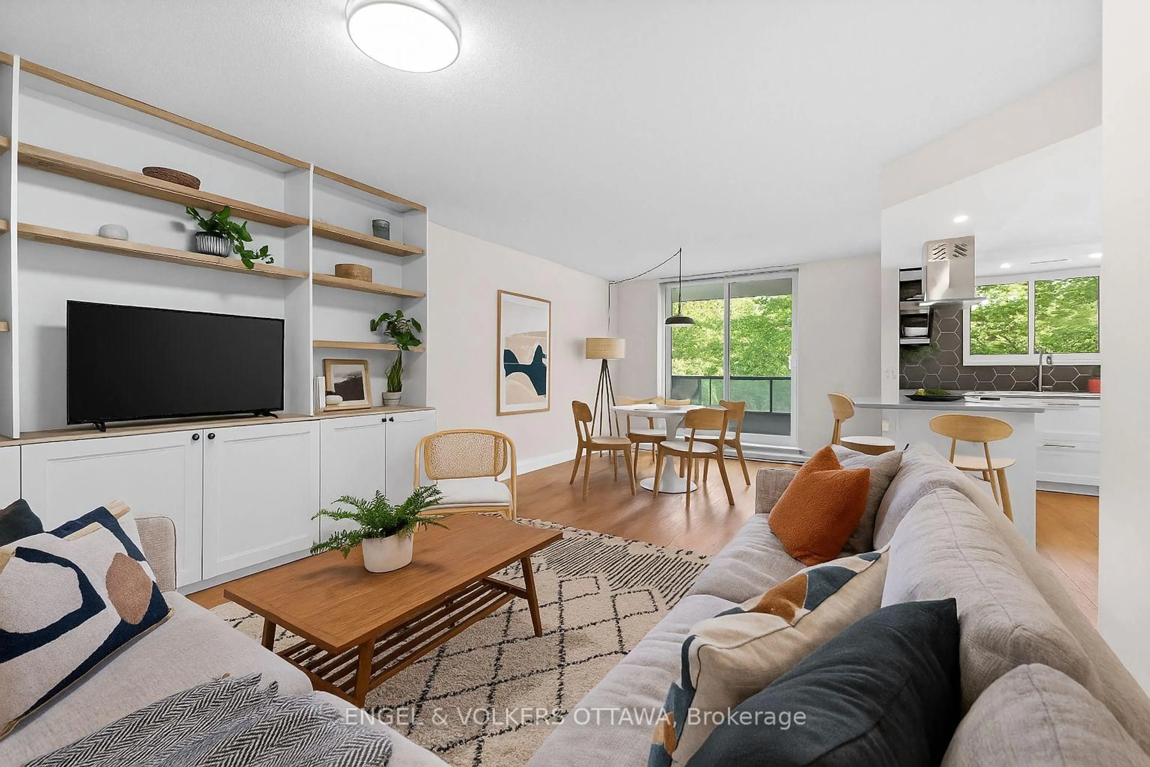 Living room with furniture, unknown for 1705 Playfair Dr #105, Ottawa Ontario K1H 8P6