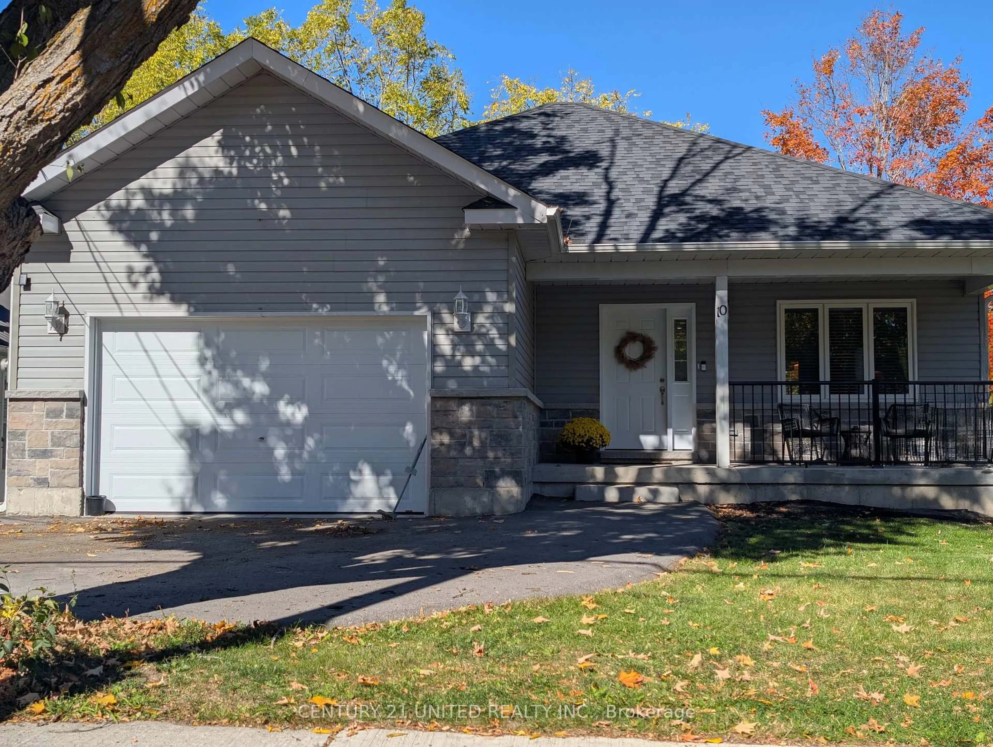 Home with vinyl exterior material, street for 10 William St, Selwyn Ontario K0L 2H0