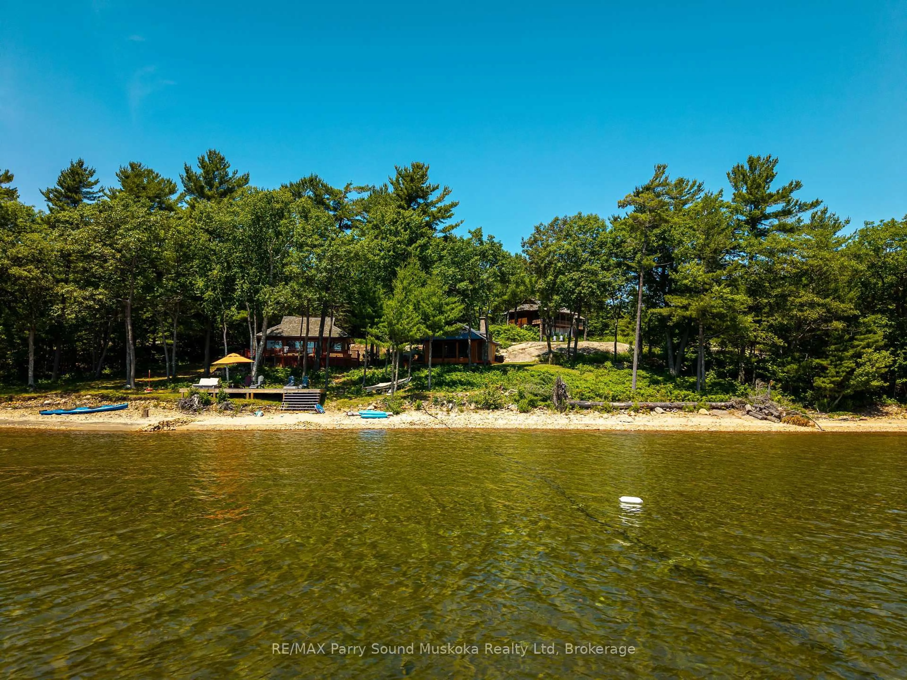 A pic from outside/outdoor area/front of a property/back of a property/a pic from drone, water/lake/river/ocean view for 47 Linda Lane, Carling Ontario P0G 1G0