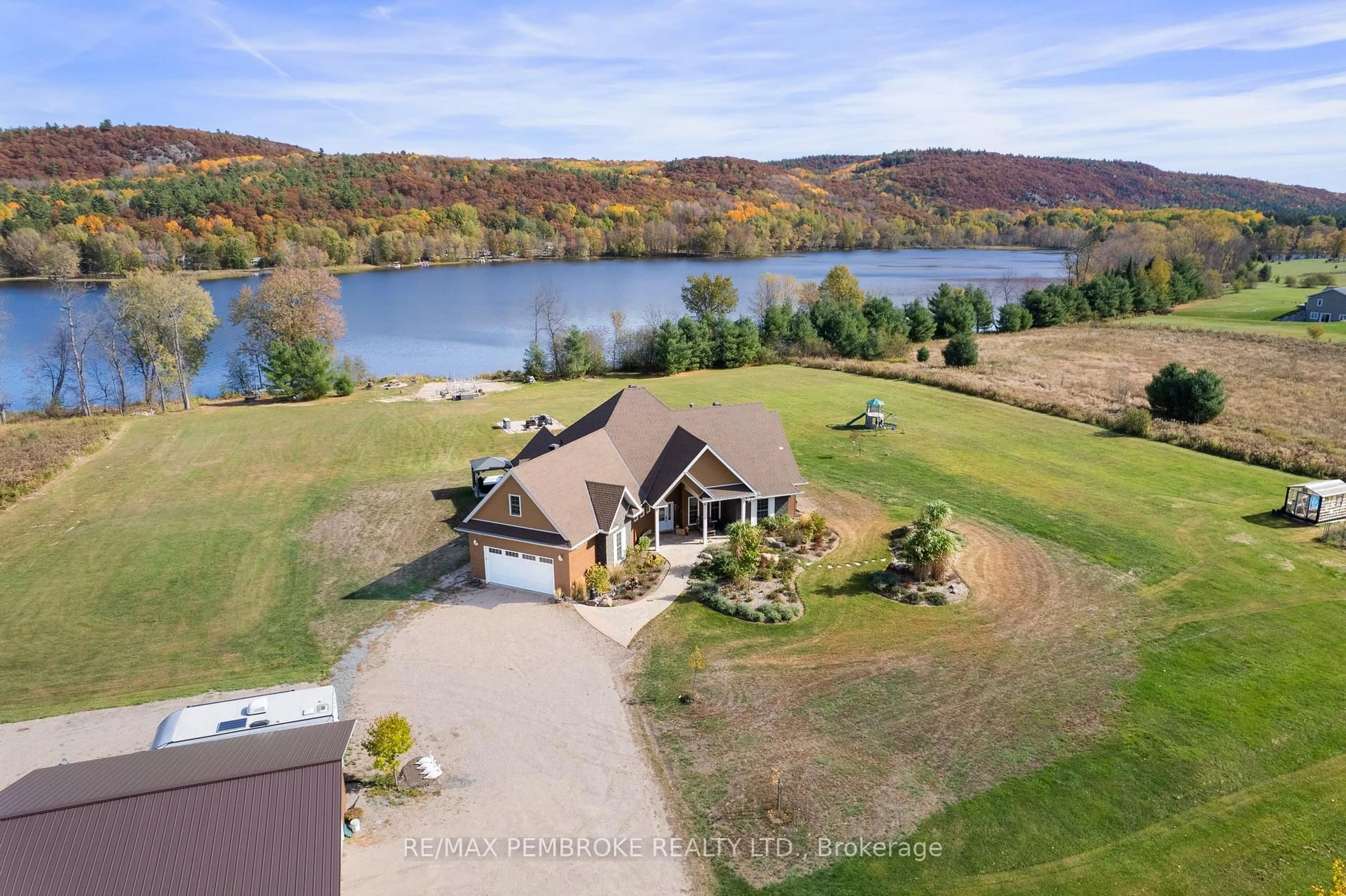 A pic from outside/outdoor area/front of a property/back of a property/a pic from drone, water/lake/river/ocean view for 43 Green Gate Lane, Golden Lake Ontario K0J 1X0