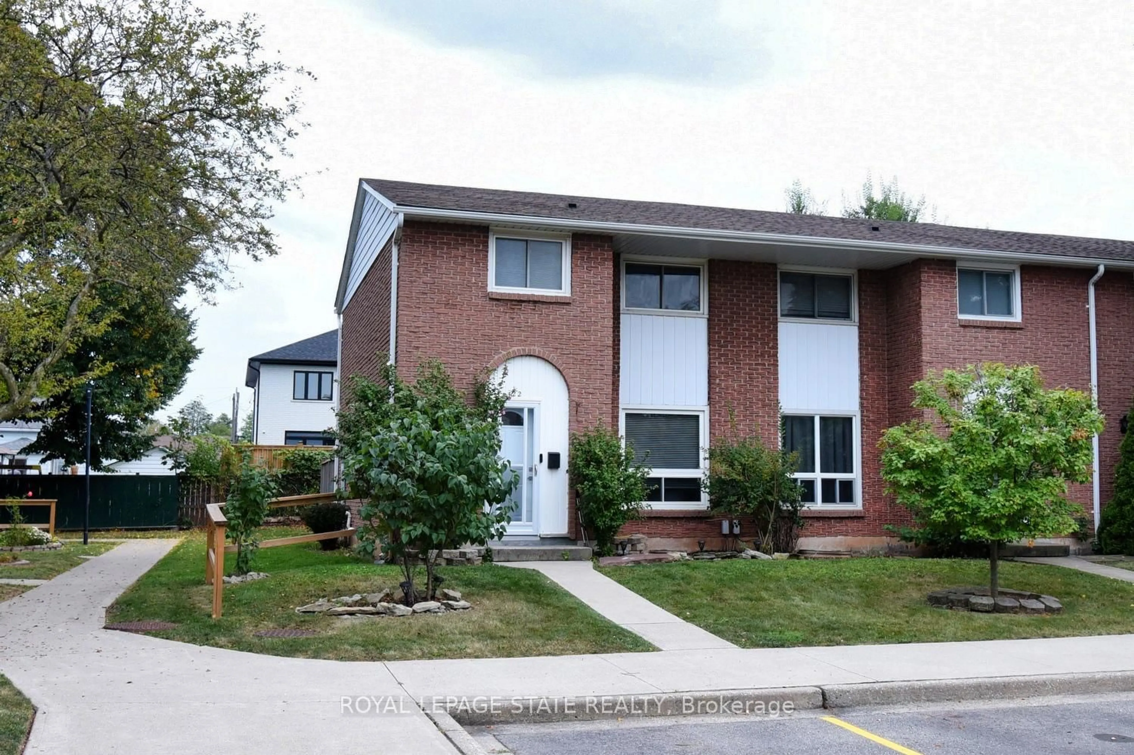 Home with brick exterior material, street for 150 Gateshead Cres #122, Hamilton Ontario L8G 4A7
