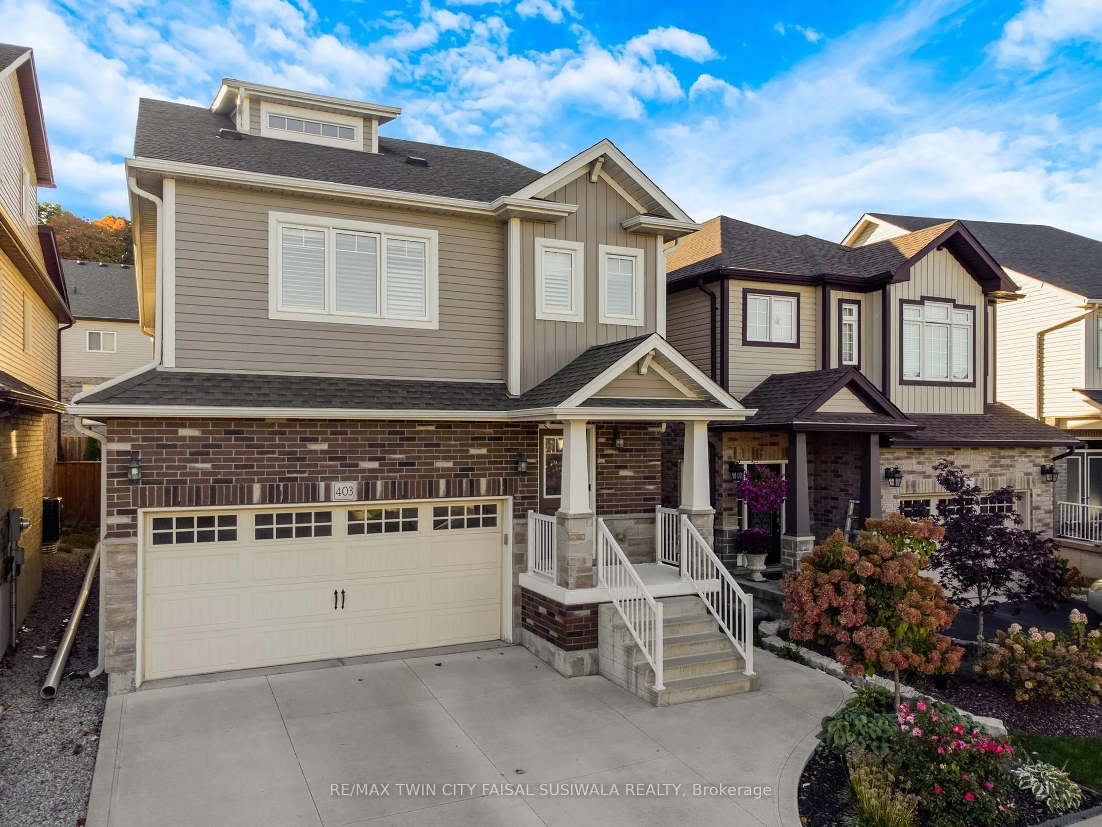 Home with vinyl exterior material, street for 403 Moorlands Cres, Kitchener Ontario N2P 0C9